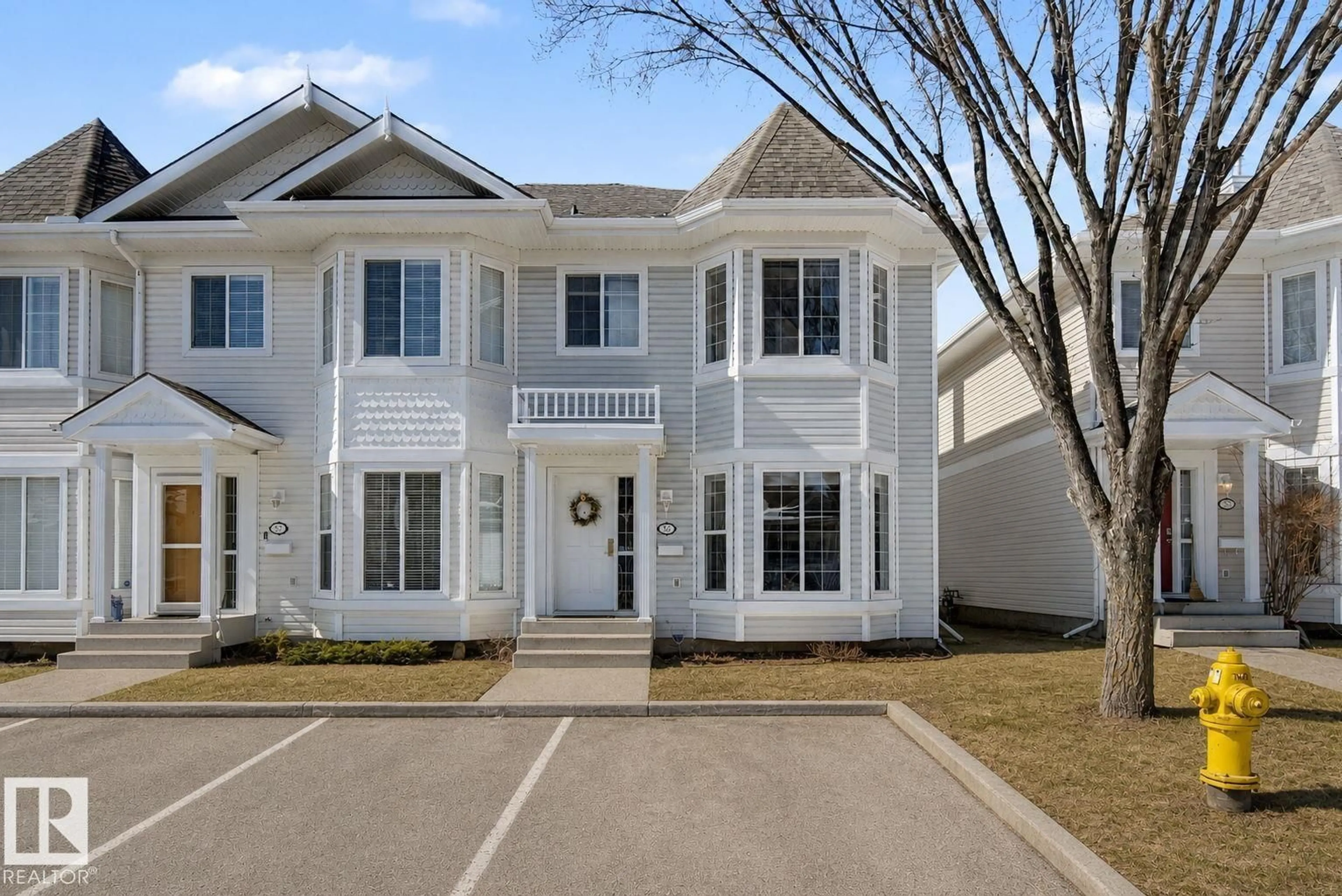 Home with vinyl exterior material, street for NW - 56 1780 GLASTONBURY BLVD, Edmonton Alberta T5T6P9