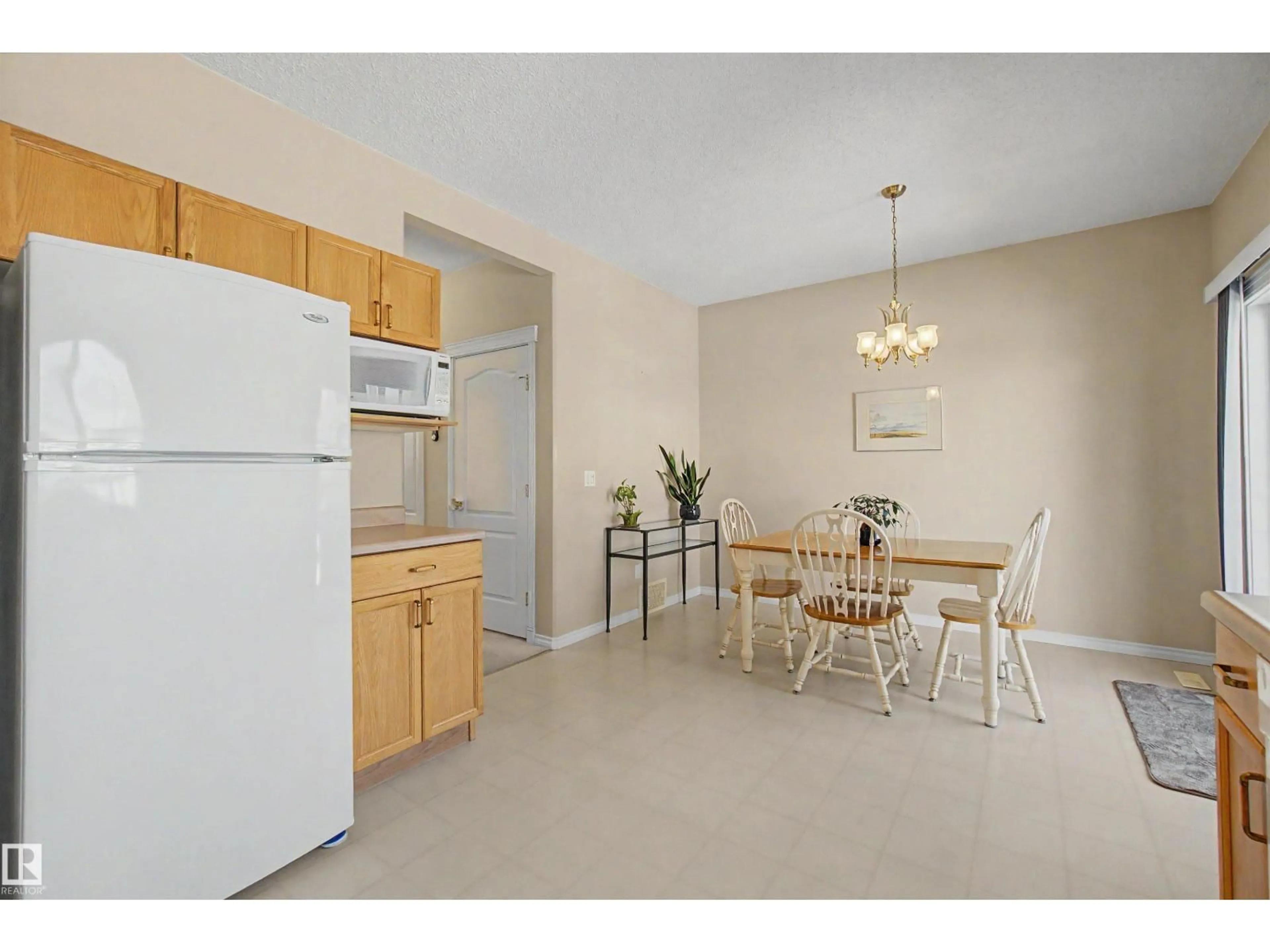 Standard kitchen, unknown for NW - 56 1780 GLASTONBURY BLVD, Edmonton Alberta T5T6P9