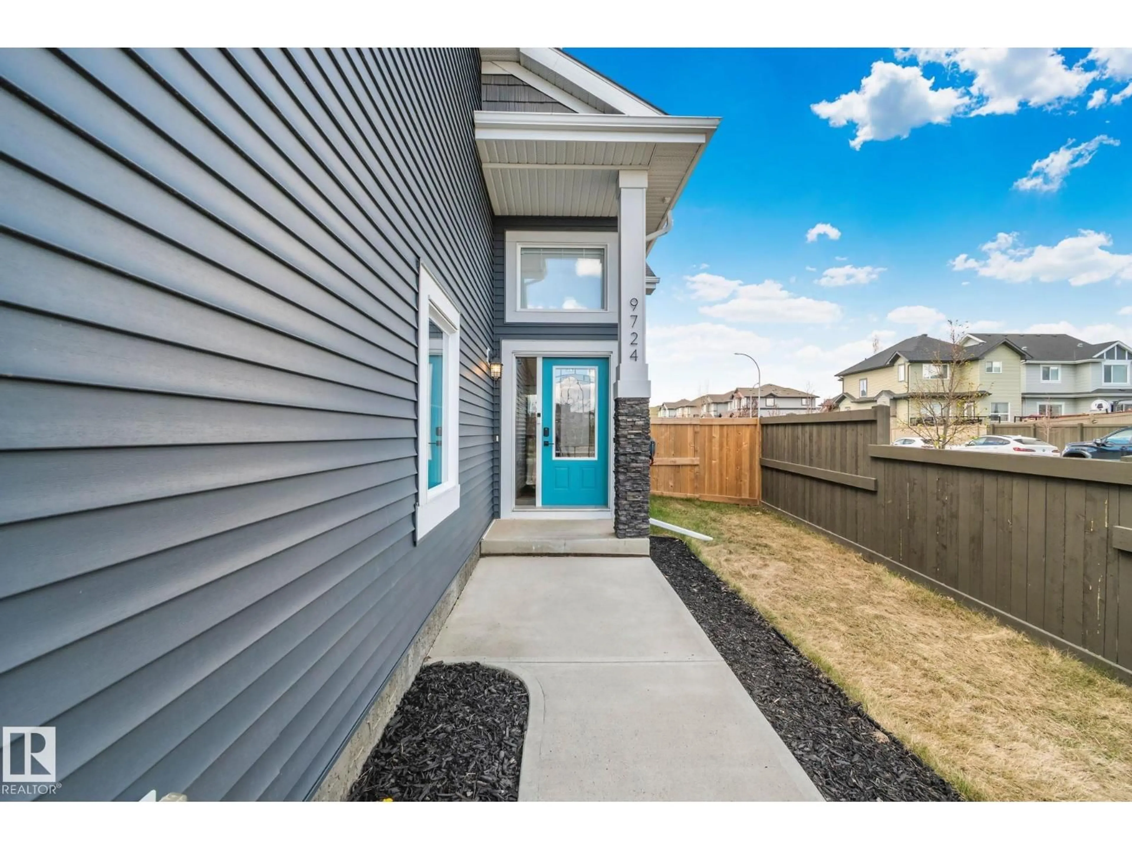 Home with vinyl exterior material, street for NW - 9724 223 ST, Edmonton Alberta T5T7B7