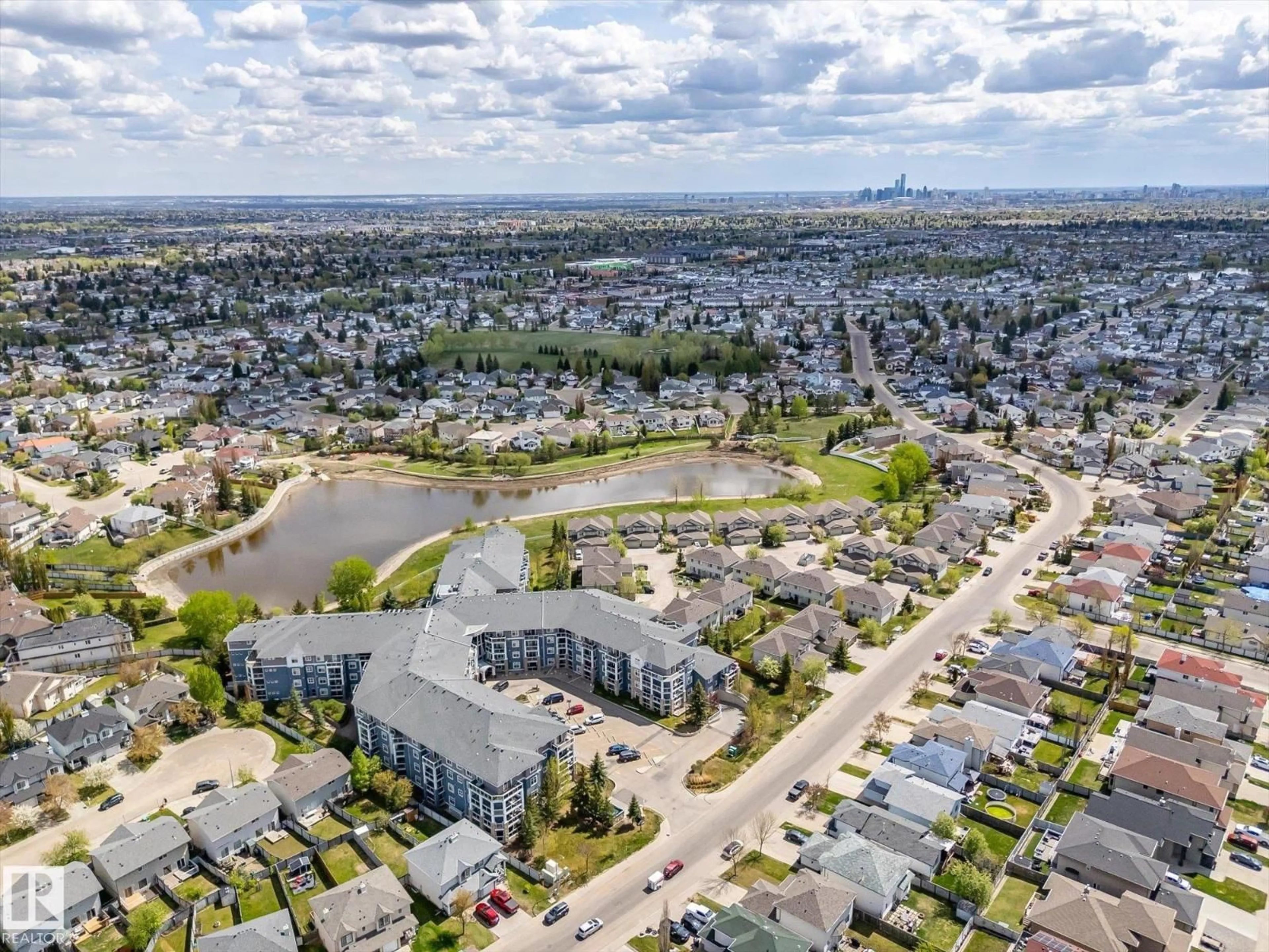 A pic from outside/outdoor area/front of a property/back of a property/a pic from drone, street for #409 - 16035 132 ST NW, Edmonton Alberta T6V0B4