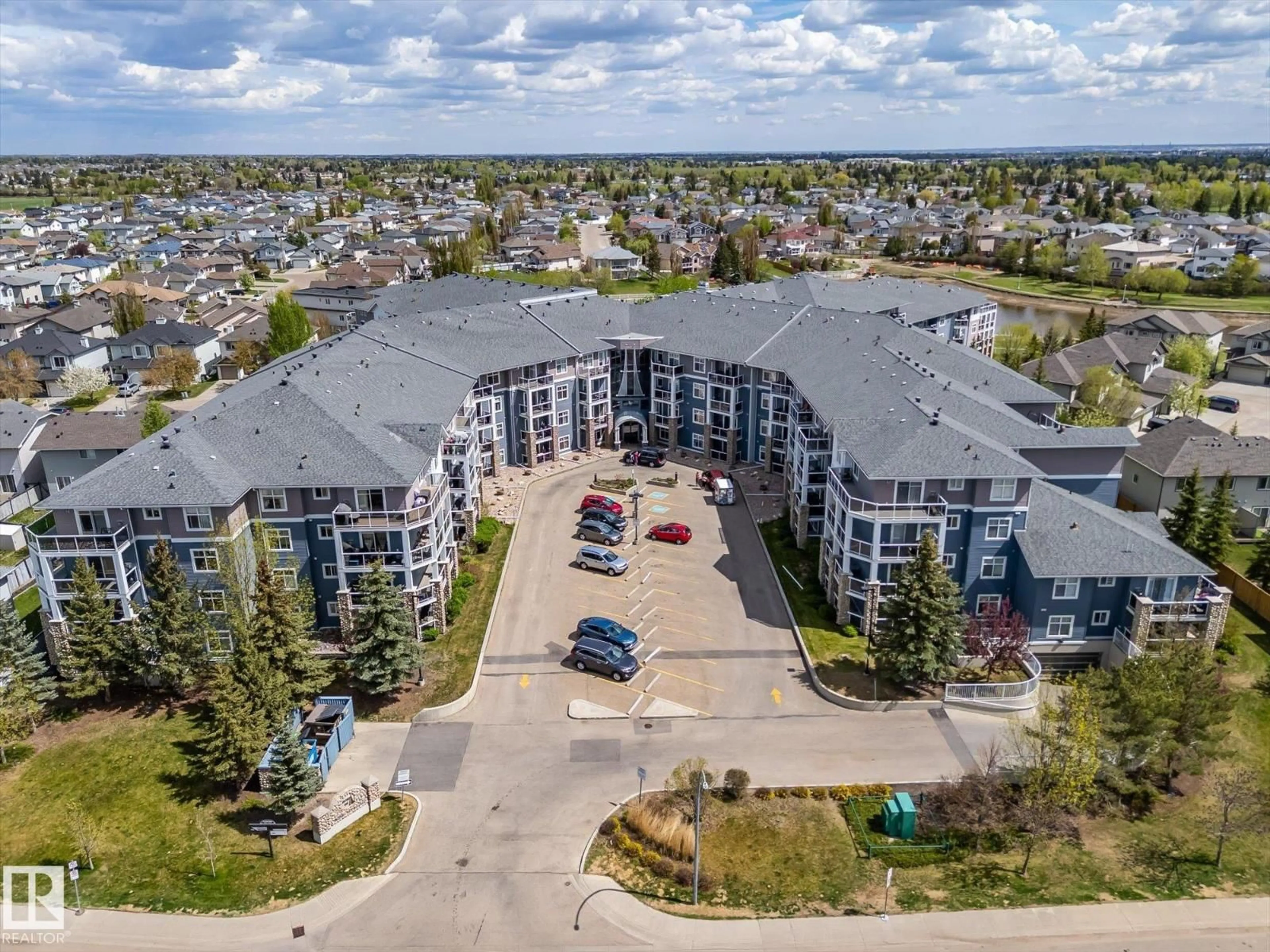 A pic from outside/outdoor area/front of a property/back of a property/a pic from drone, unknown for #409 - 16035 132 ST NW, Edmonton Alberta T6V0B4