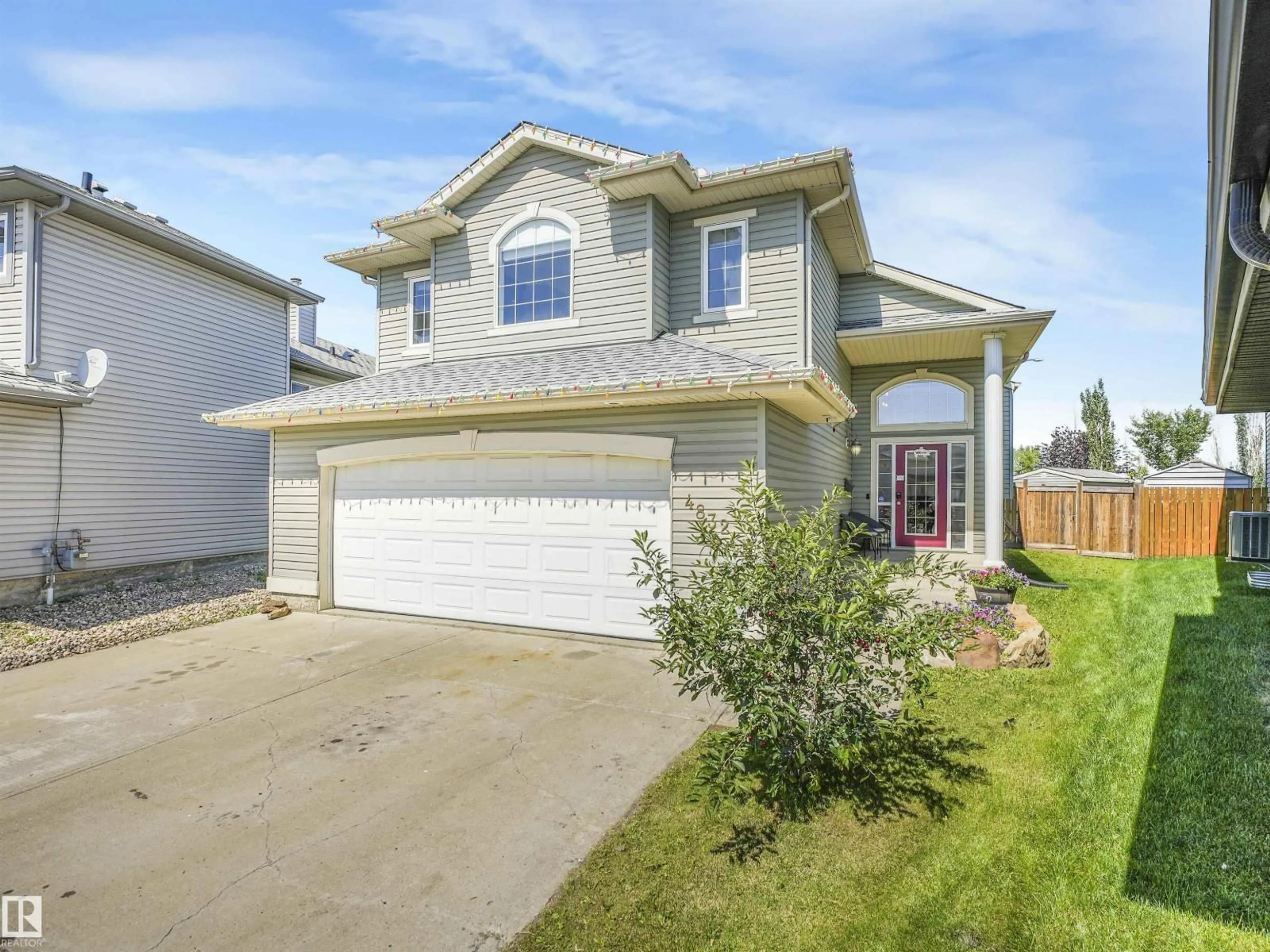 Home with vinyl exterior material, street for 4832 157 AV, Edmonton Alberta T5Y0B7