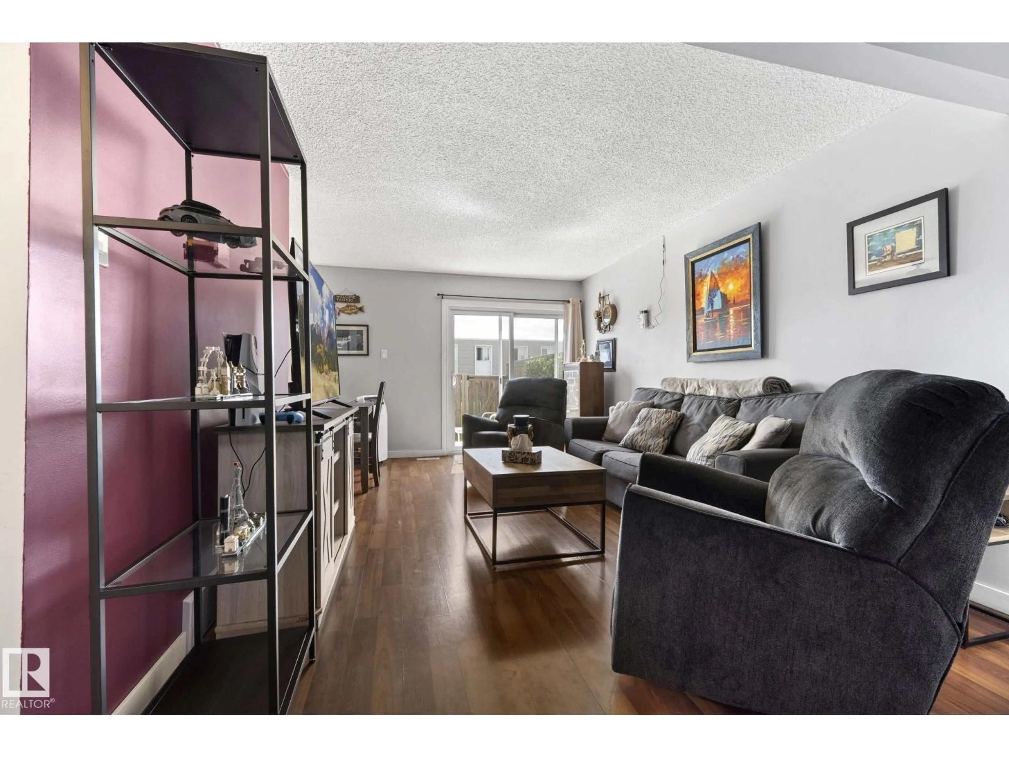 Living room with furniture, wood/laminate floor for 163 CORNELL CT, Edmonton Alberta T5C3C3