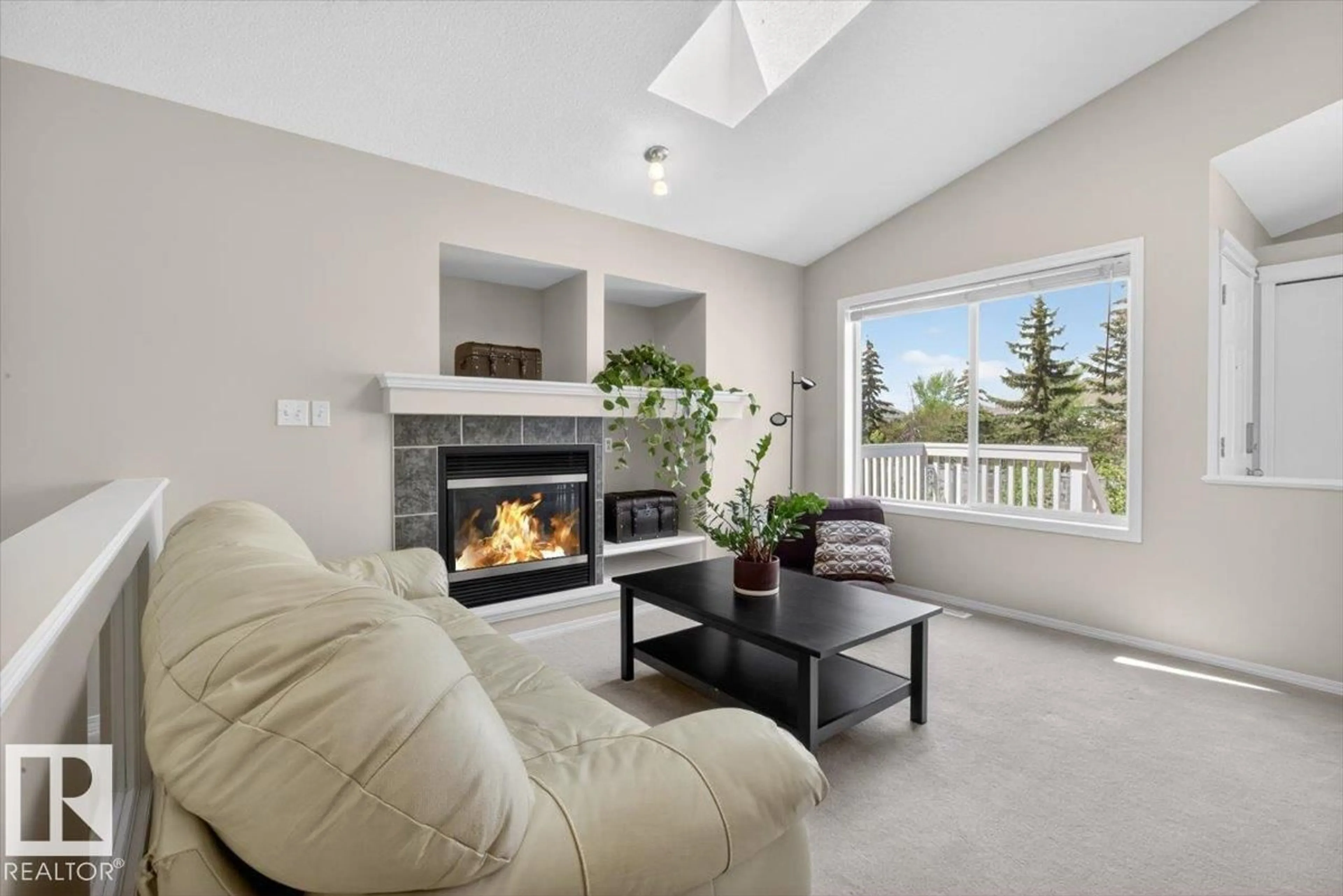 Living room with furniture, ceramic/tile floor for SW - 7928 10 AV, Edmonton Alberta T6X1E6