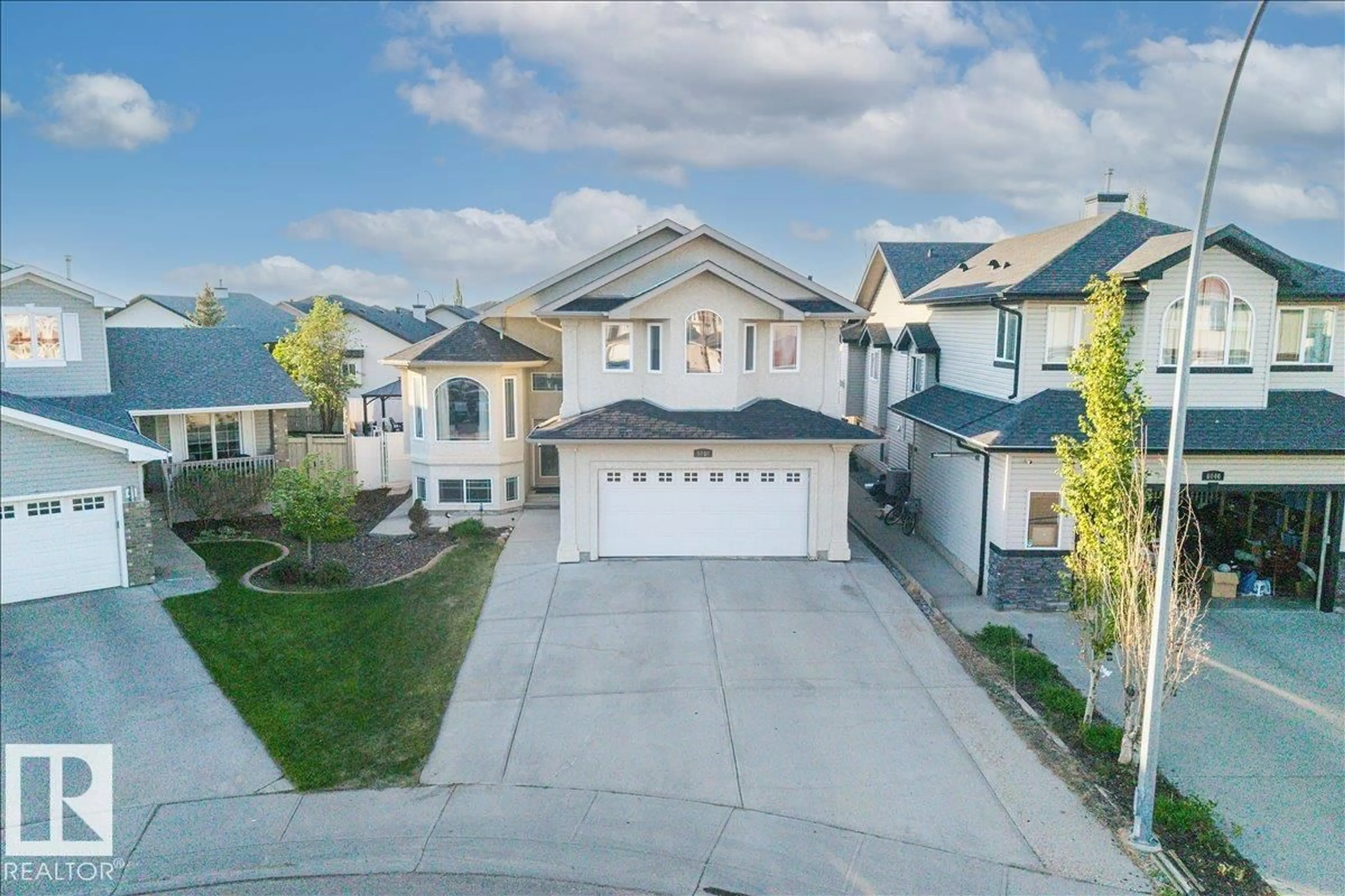 A pic from outside/outdoor area/front of a property/back of a property/a pic from drone, street for 6050 164A AV, Edmonton Alberta T5Y0A7