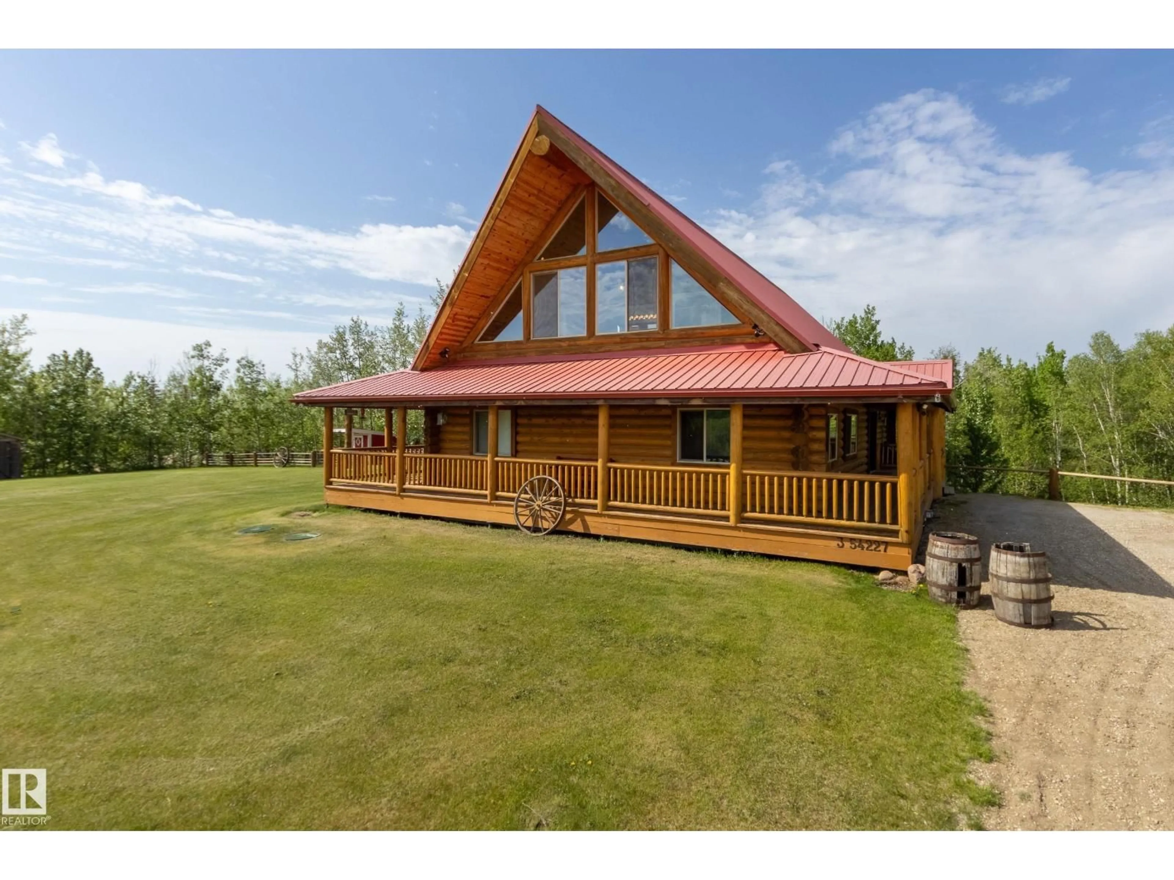 A pic from outside/outdoor area/front of a property/back of a property/a pic from drone, mountain view for 3 - 54227 RGE ROAD 275, Rural Sturgeon County Alberta T8R1Y9