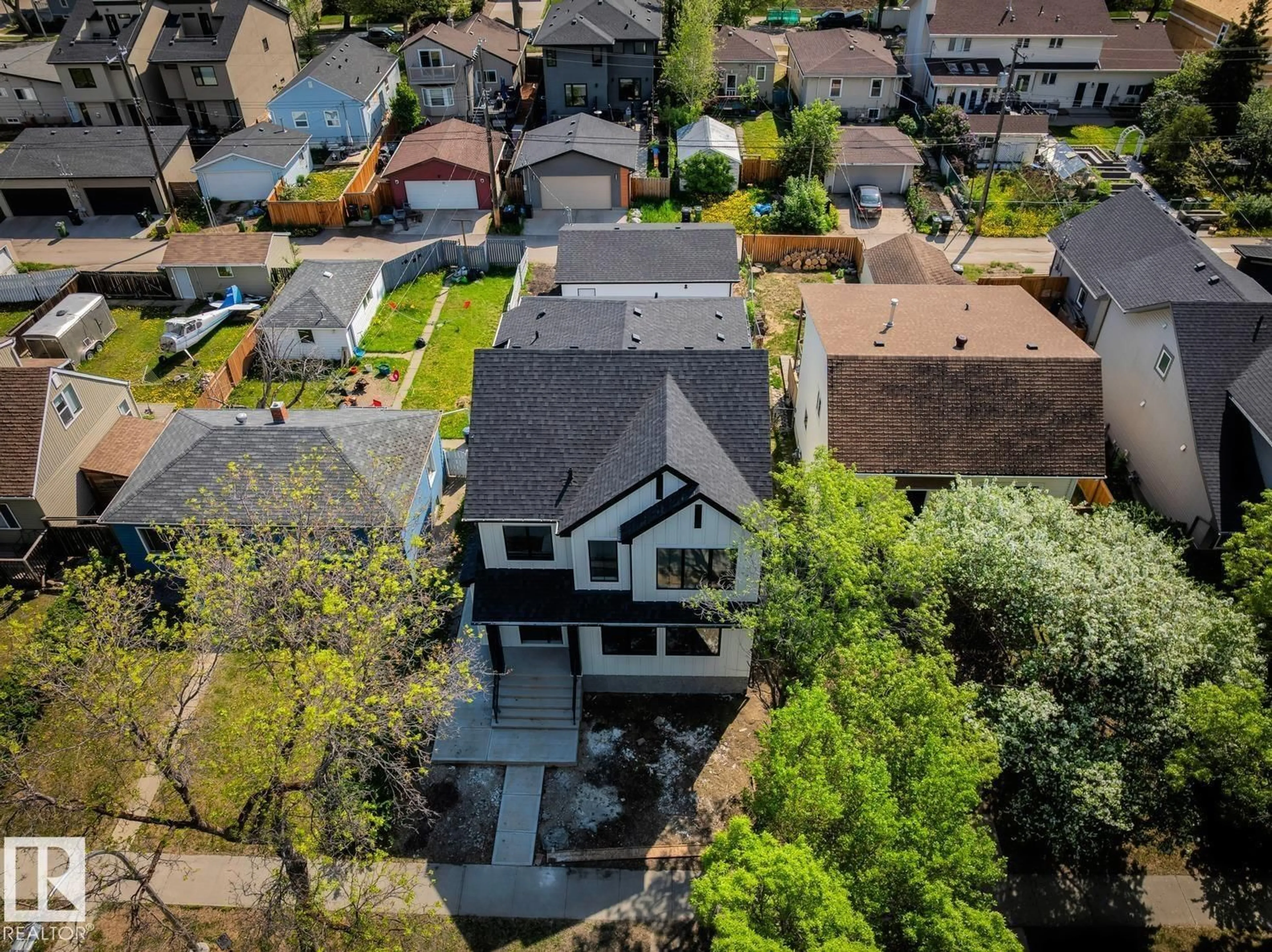 A pic from outside/outdoor area/front of a property/back of a property/a pic from drone, street for NW - 9023 90 ST, Edmonton Alberta T6C3L8