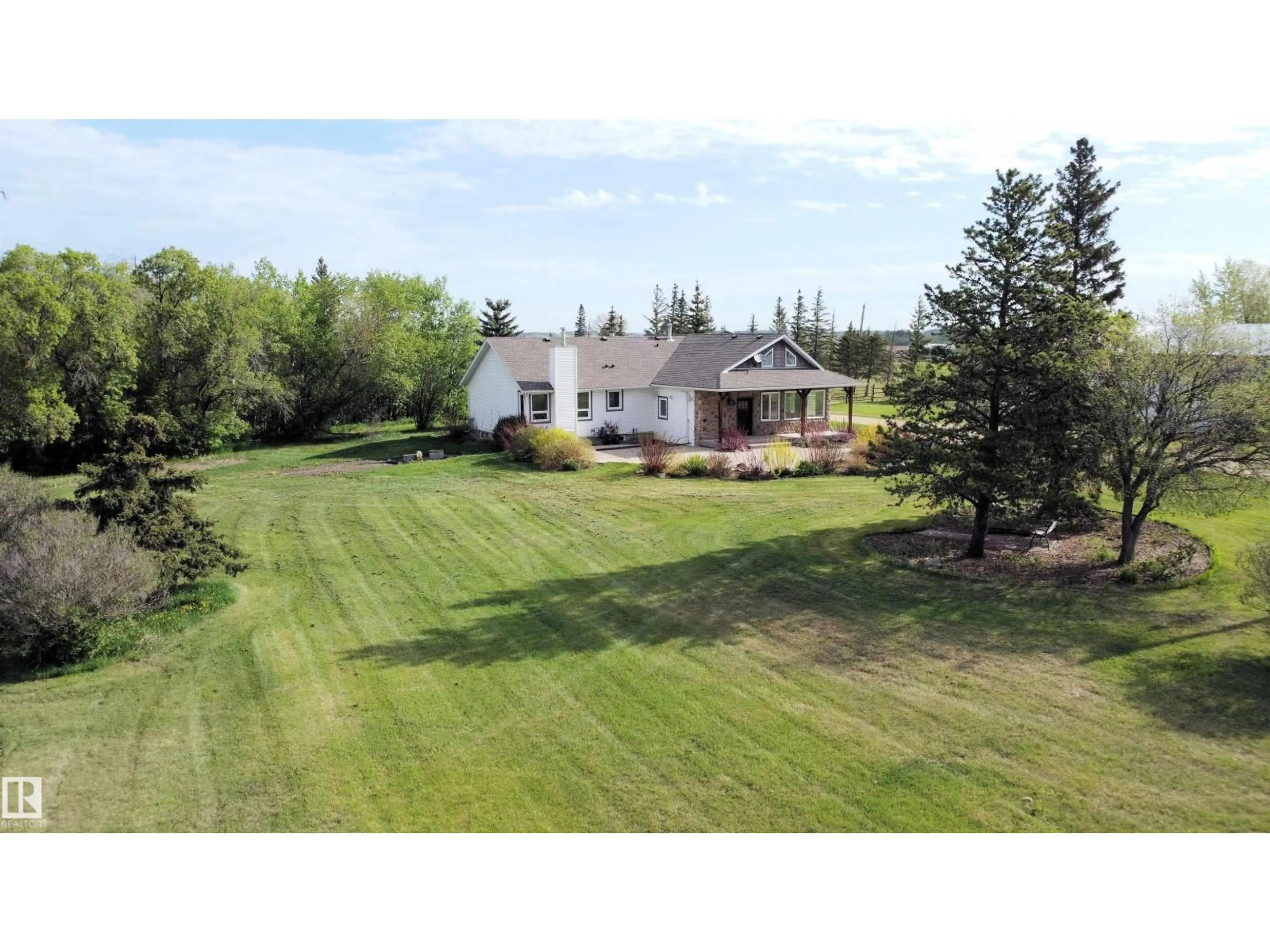 A pic from outside/outdoor area/front of a property/back of a property/a pic from drone, unknown for 26317 TWP ROAD 552, Rural Sturgeon County Alberta T8R1T4