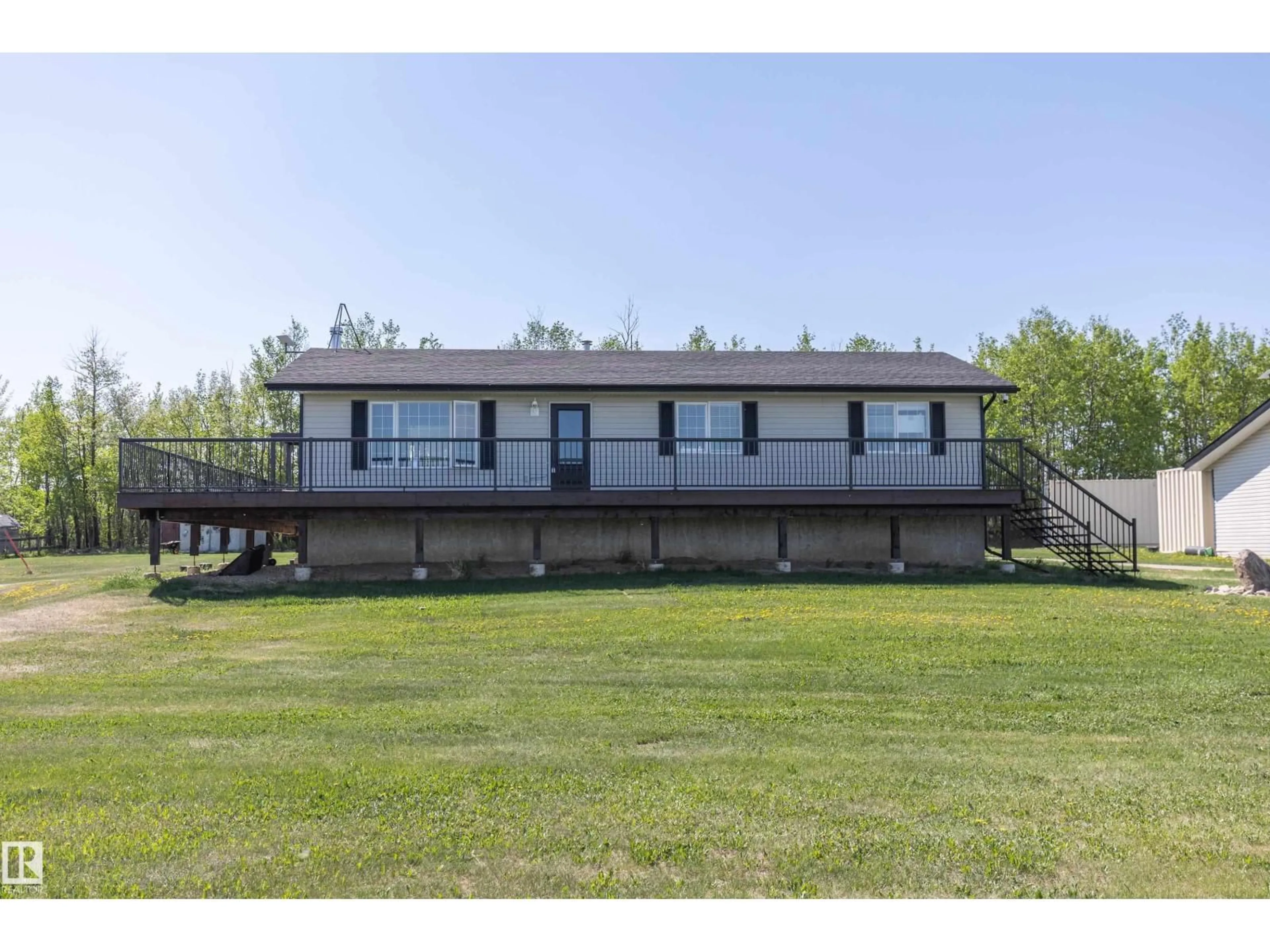 A pic from outside/outdoor area/front of a property/back of a property/a pic from drone, unknown for 90 22111 TWP RD, Rural Leduc County Alberta T0B3M2