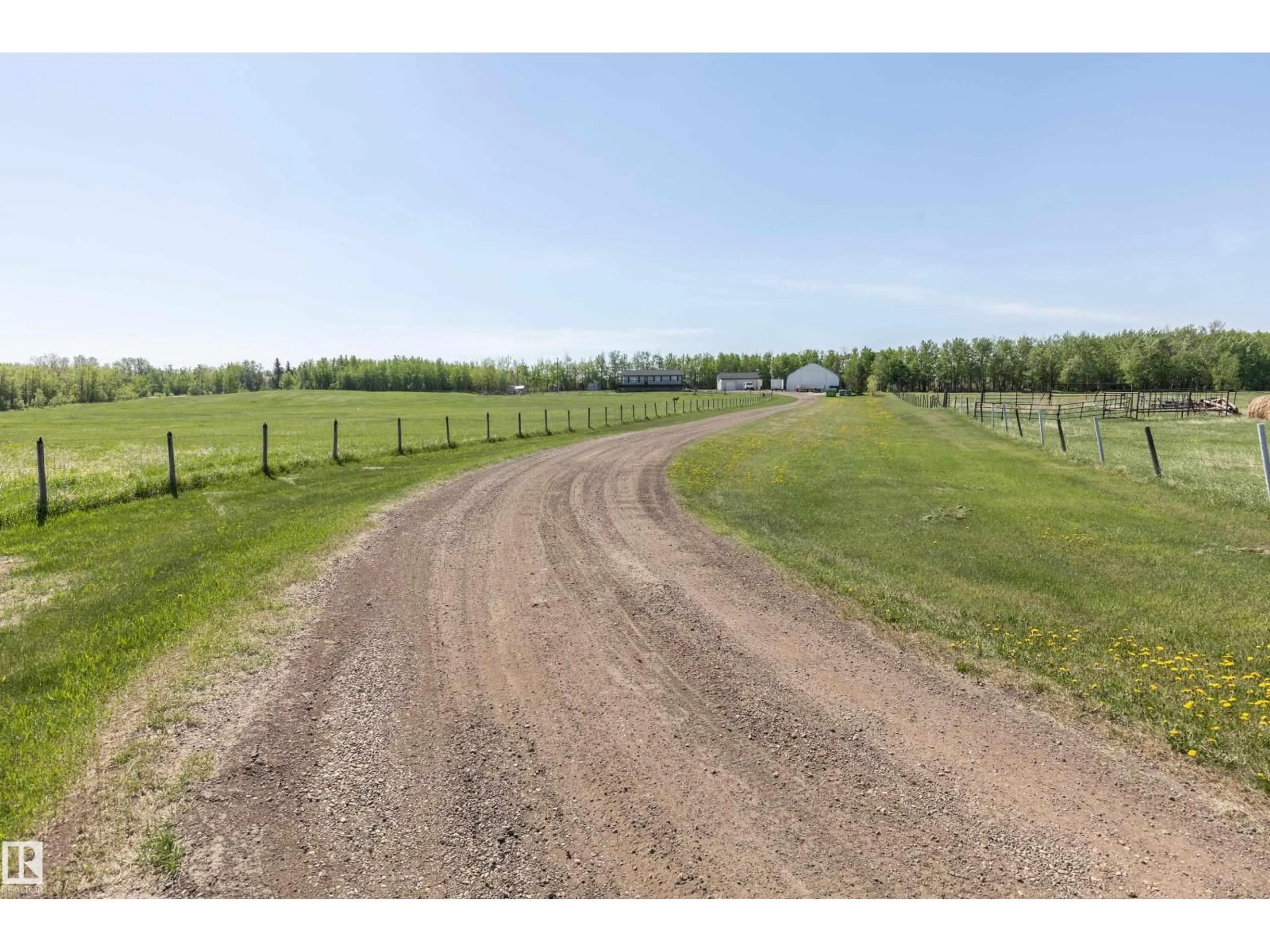 A pic from outside/outdoor area/front of a property/back of a property/a pic from drone, unknown for 90 22111 TWP RD, Rural Leduc County Alberta T0B3M2