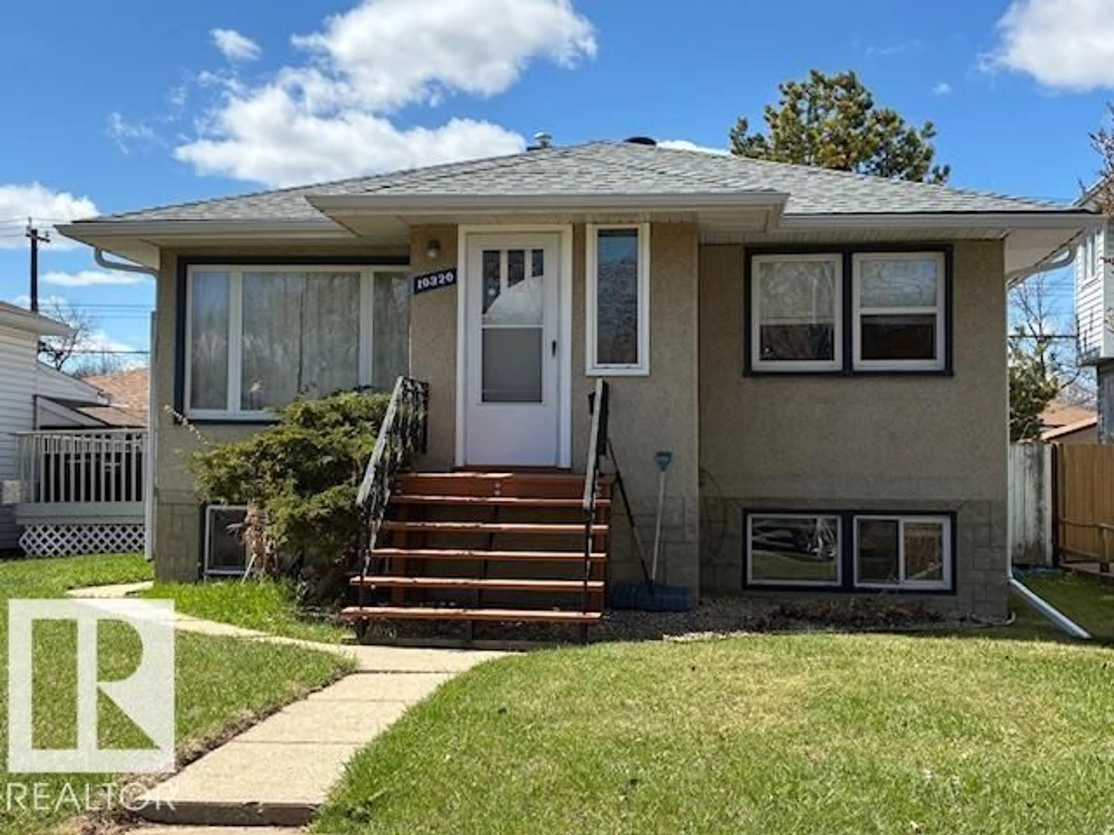 Home with vinyl exterior material, street for 10320 79 ST, Edmonton Alberta T6A3G8