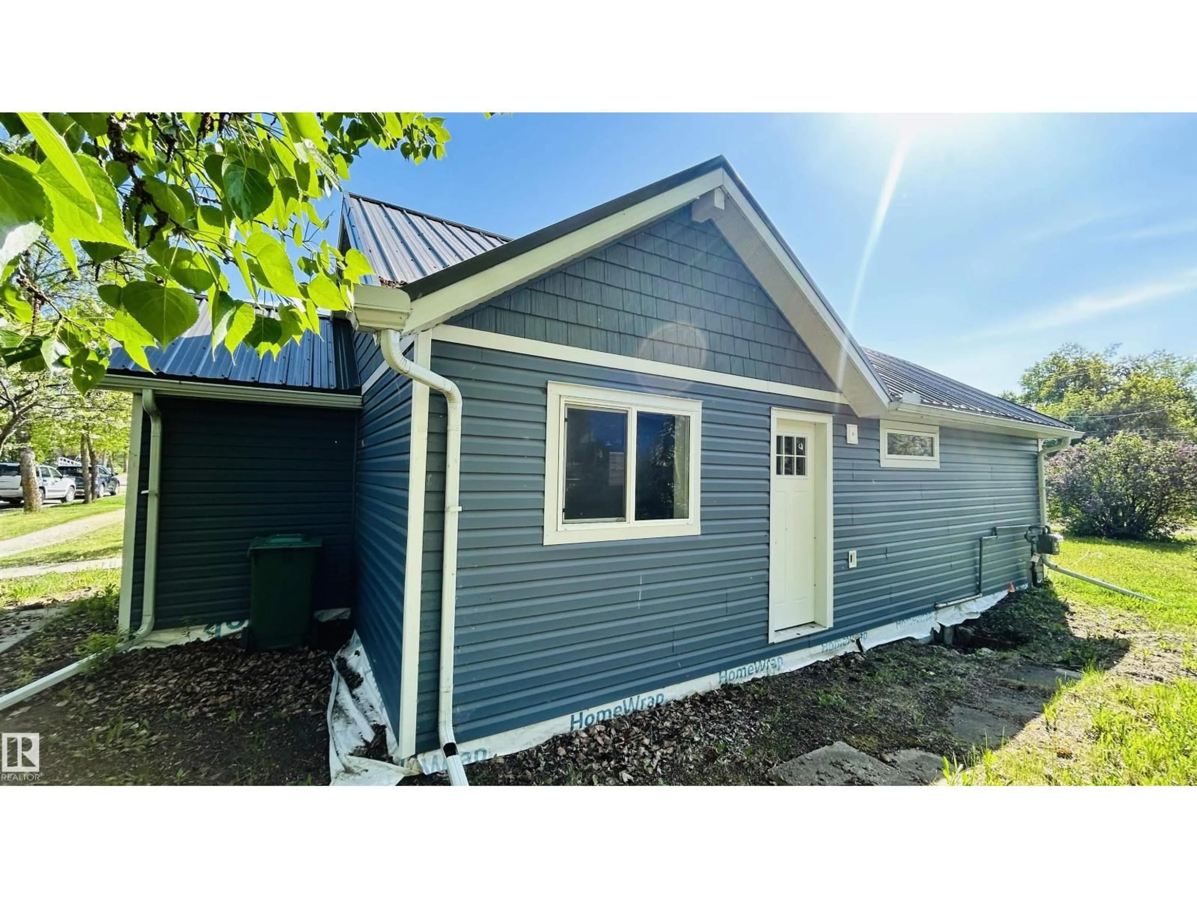 Home with vinyl exterior material, street for 5208 51 ST, Bonnyville Town Alberta T9N2E3