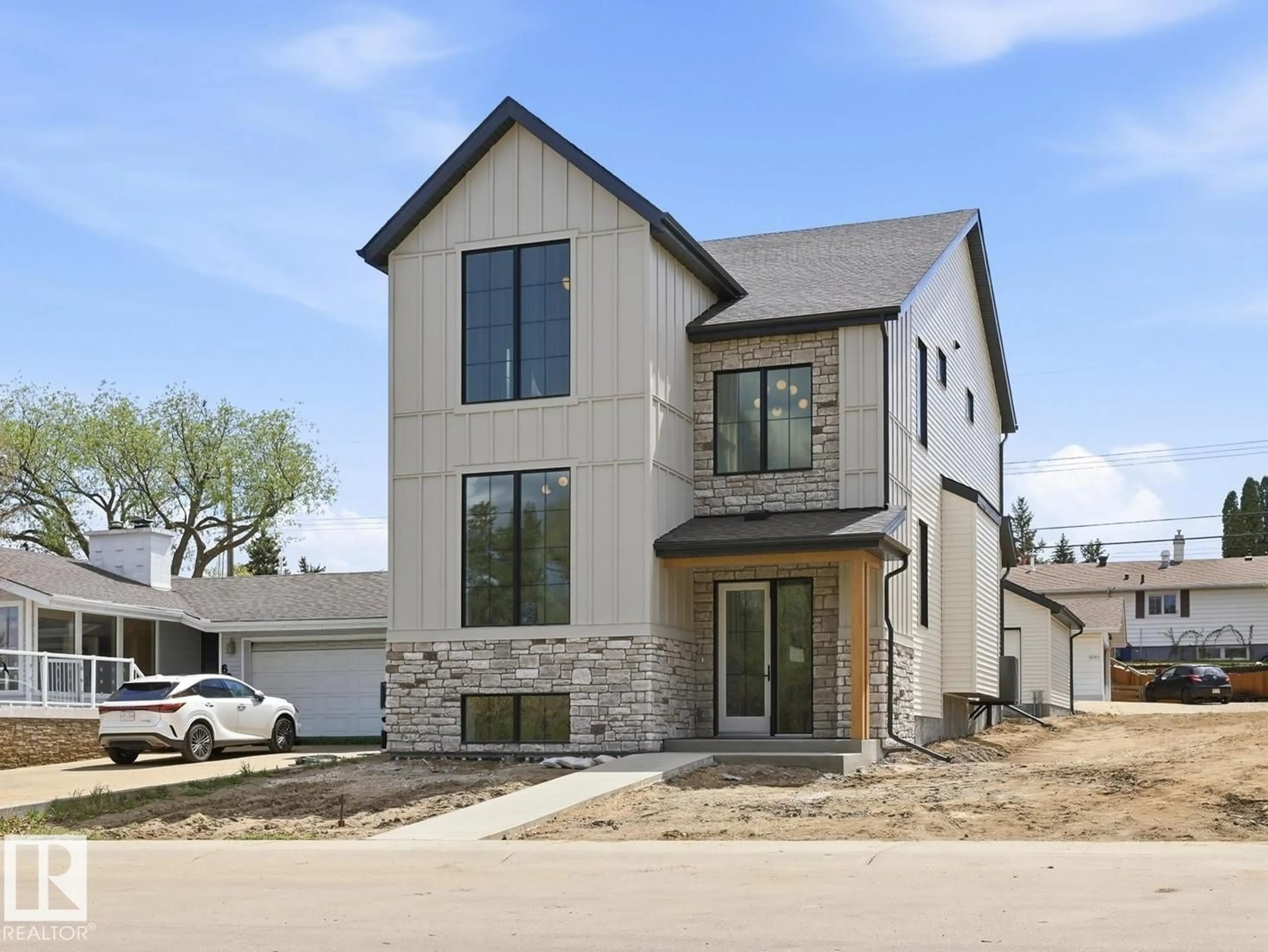 Home with brick exterior material, street for NW - 6303 109B AV, Edmonton Alberta T6A1S7