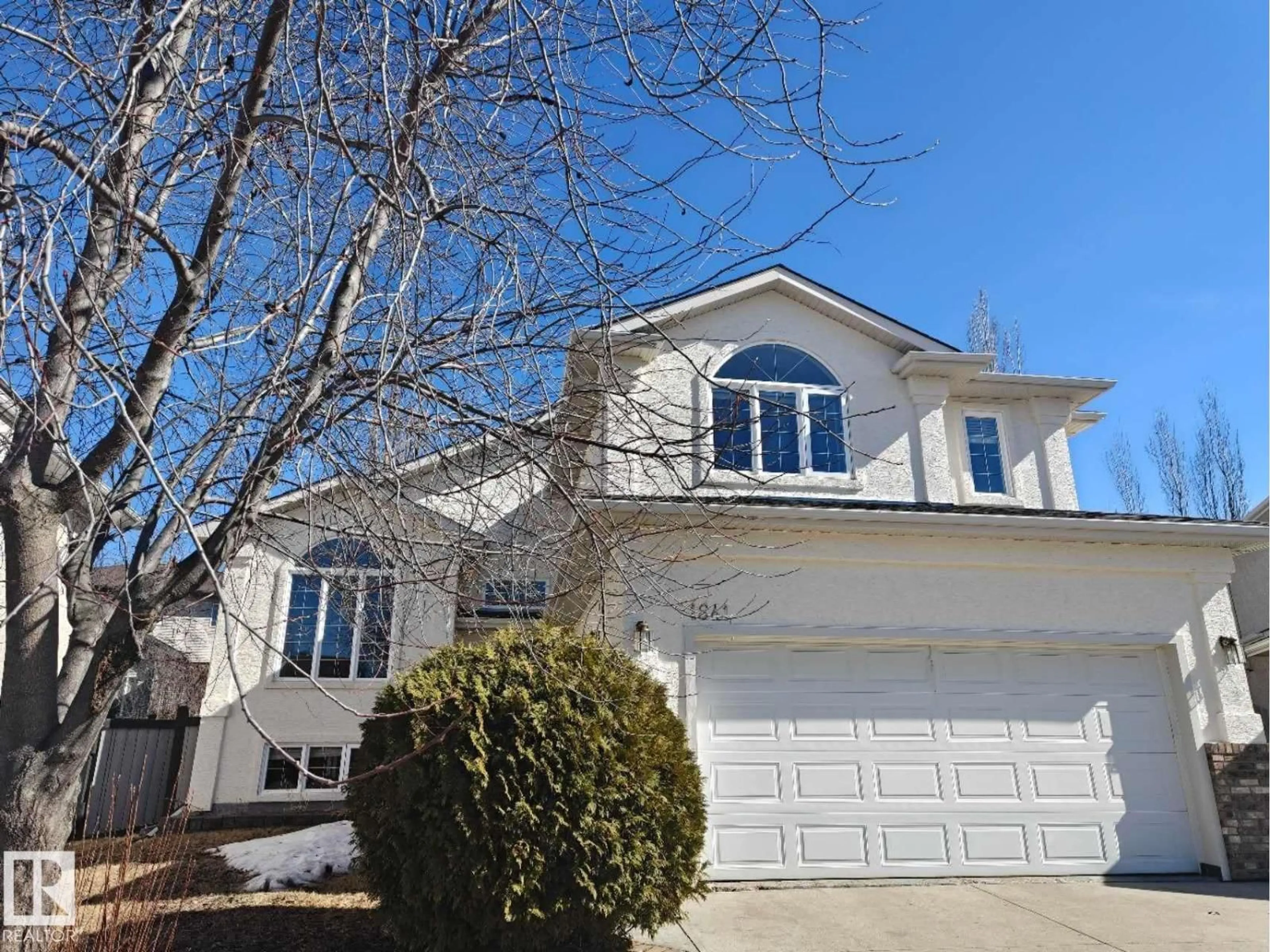 Home with vinyl exterior material, street for 1641 FORBES WY, Edmonton Alberta T6R2R9