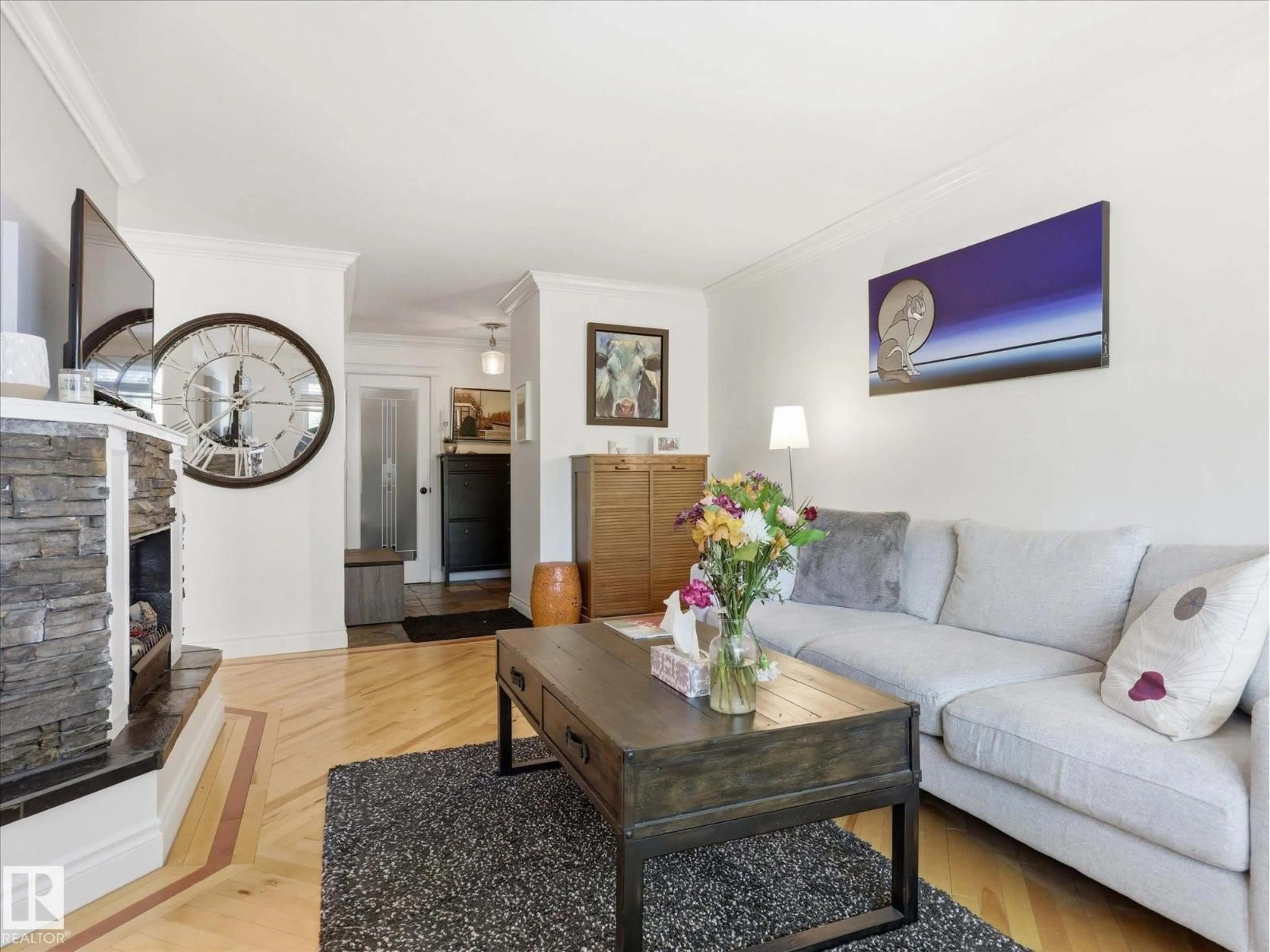 Living room with furniture, wood/laminate floor for #301 - 10003 87 AV NW, Edmonton Alberta T6E2P1
