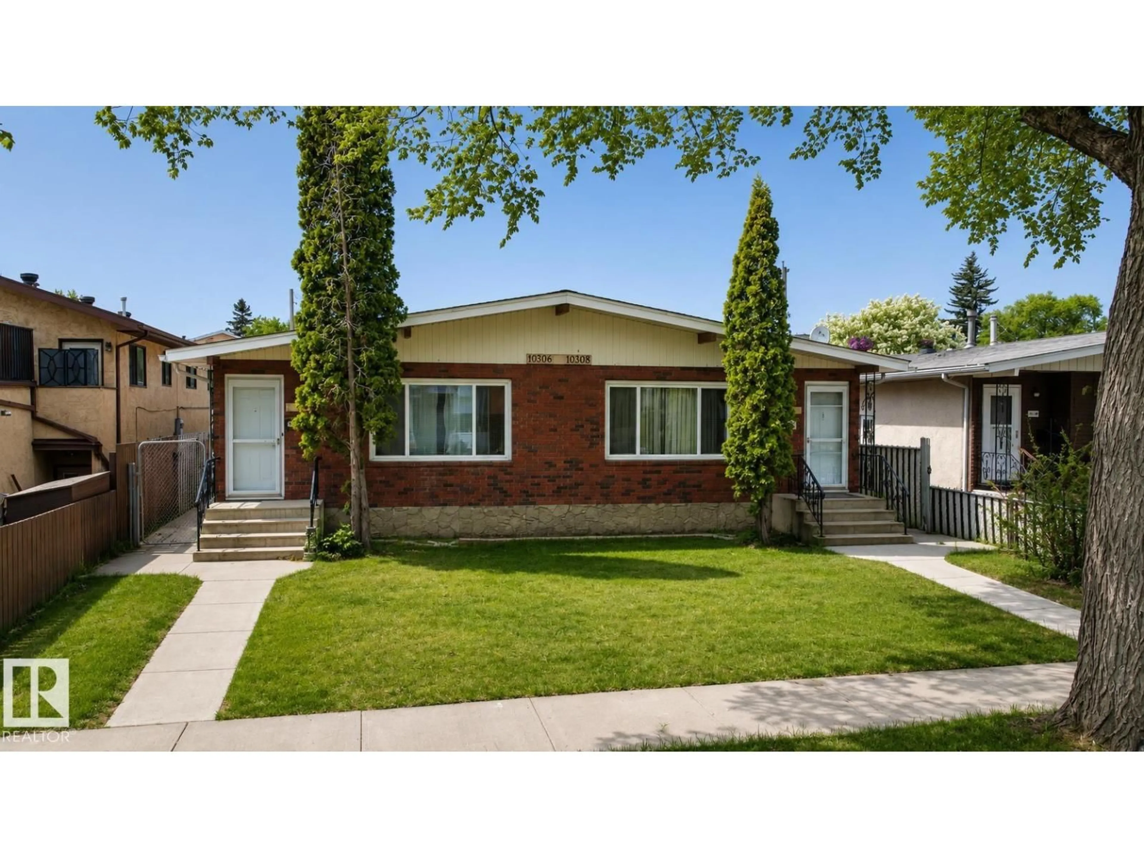 Home with brick exterior material, street for NW - 10306 & 10308 152 ST, Edmonton Alberta T5P1Y5