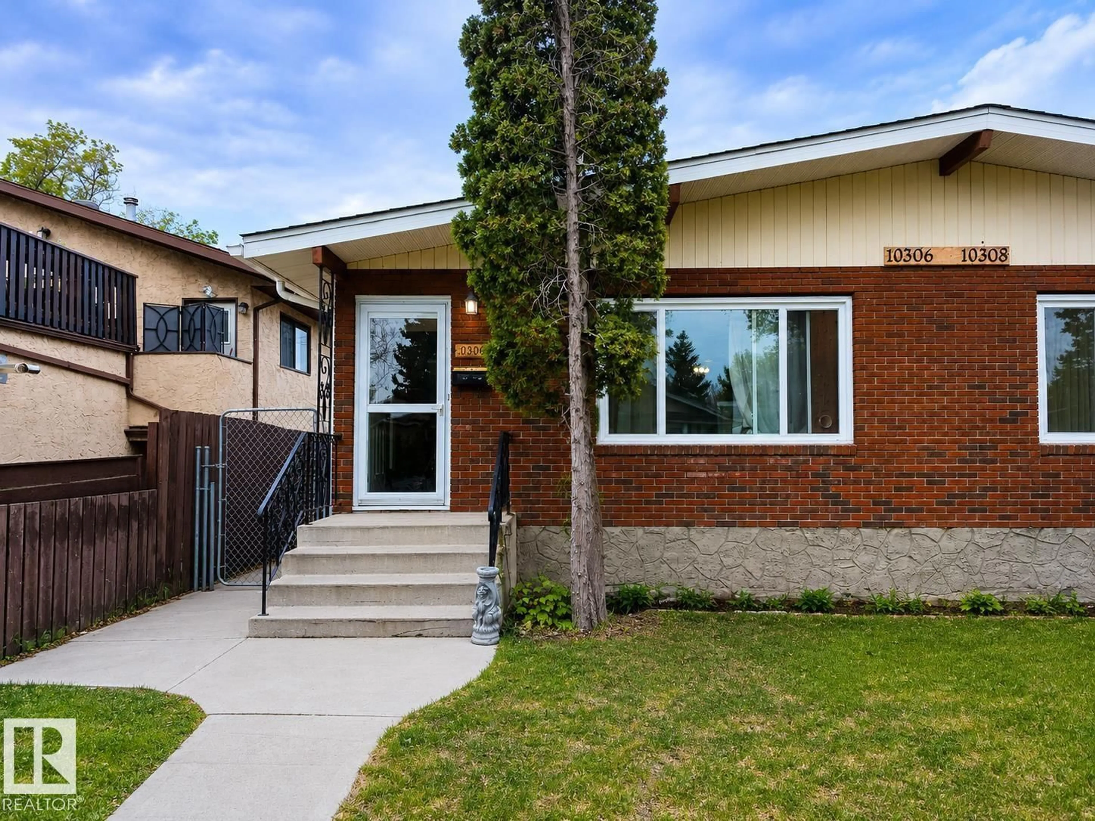 Home with brick exterior material, street for NW - 10306 & 10308 152 ST, Edmonton Alberta T5P1Y5