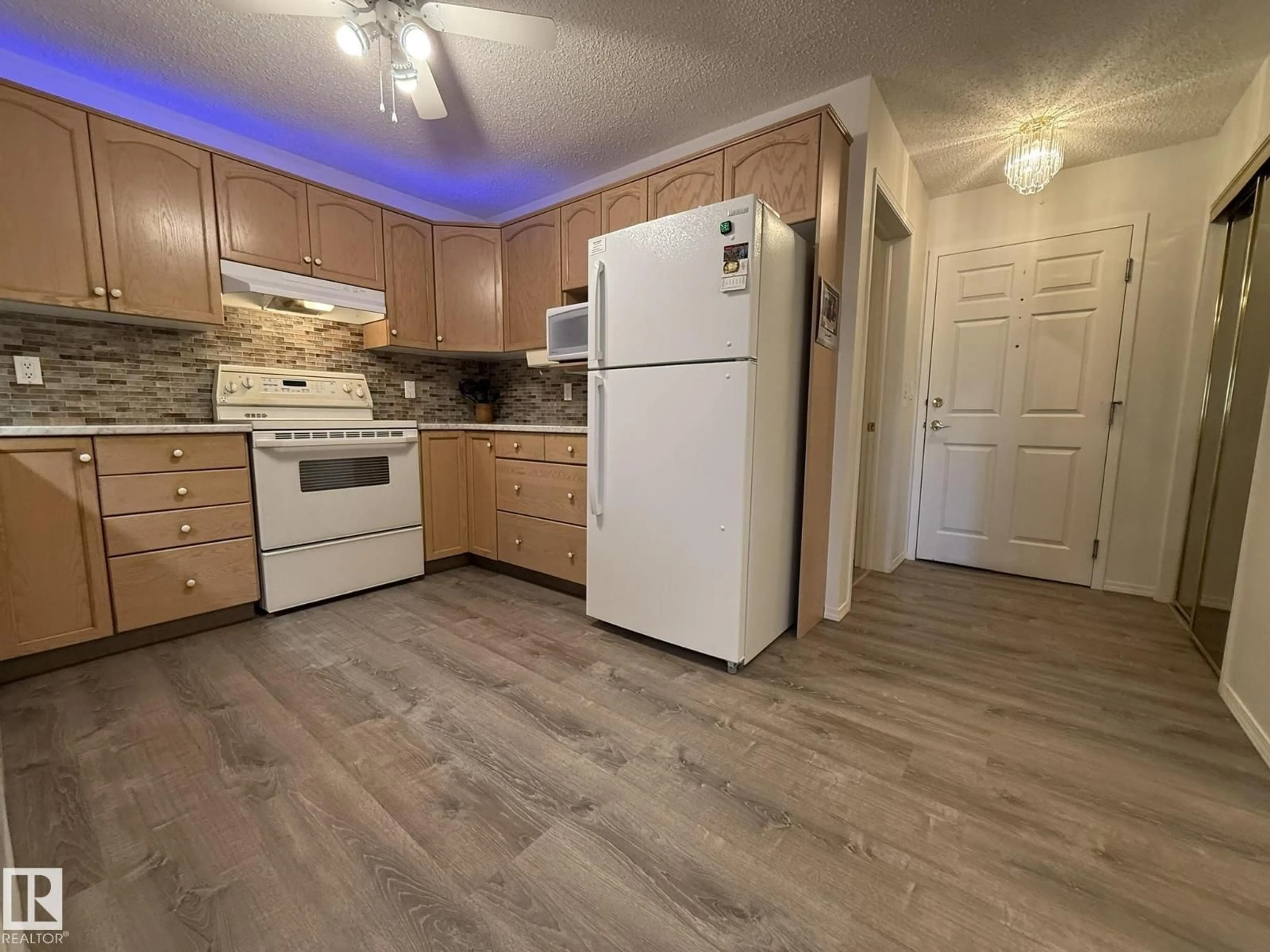 Standard kitchen, wood/laminate floor for #102 - 10903 21 AV, Edmonton Alberta T6J7A4