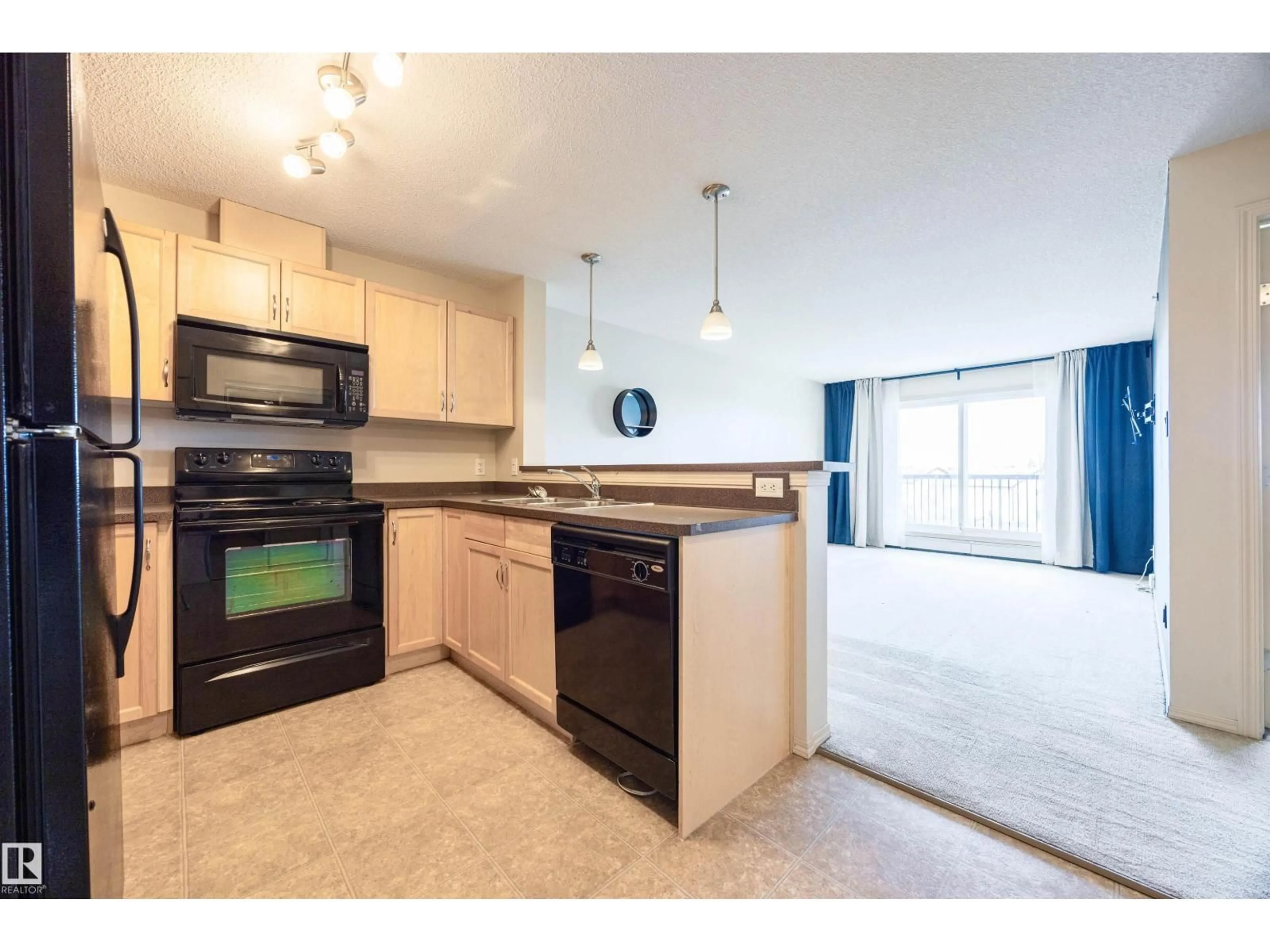 Standard kitchen, unknown for #404 - 5951 165 AV, Edmonton Alberta T5Y0J6