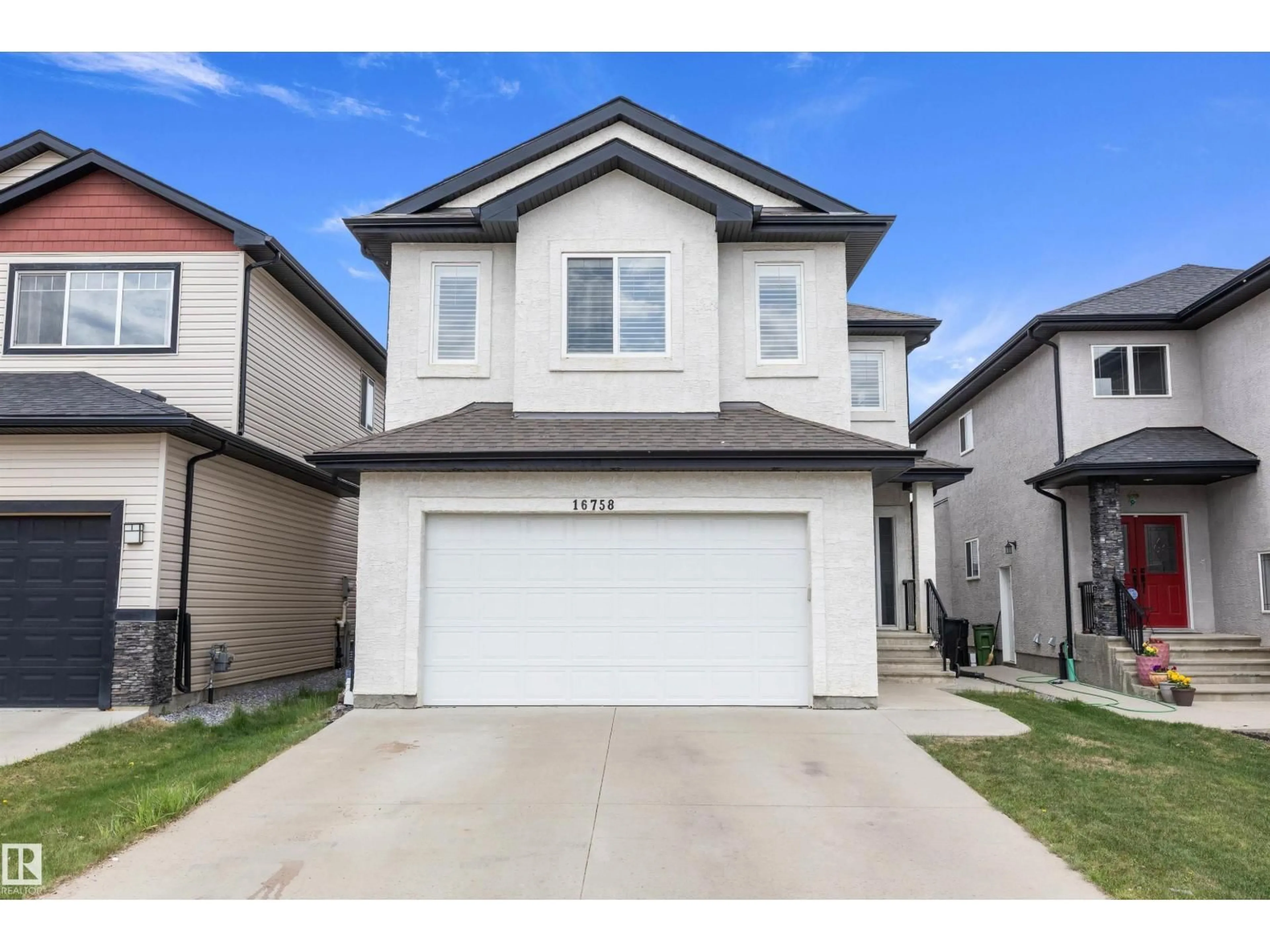 Home with vinyl exterior material, street for NW - 16758 62 ST, Edmonton Alberta T5Y0Z7