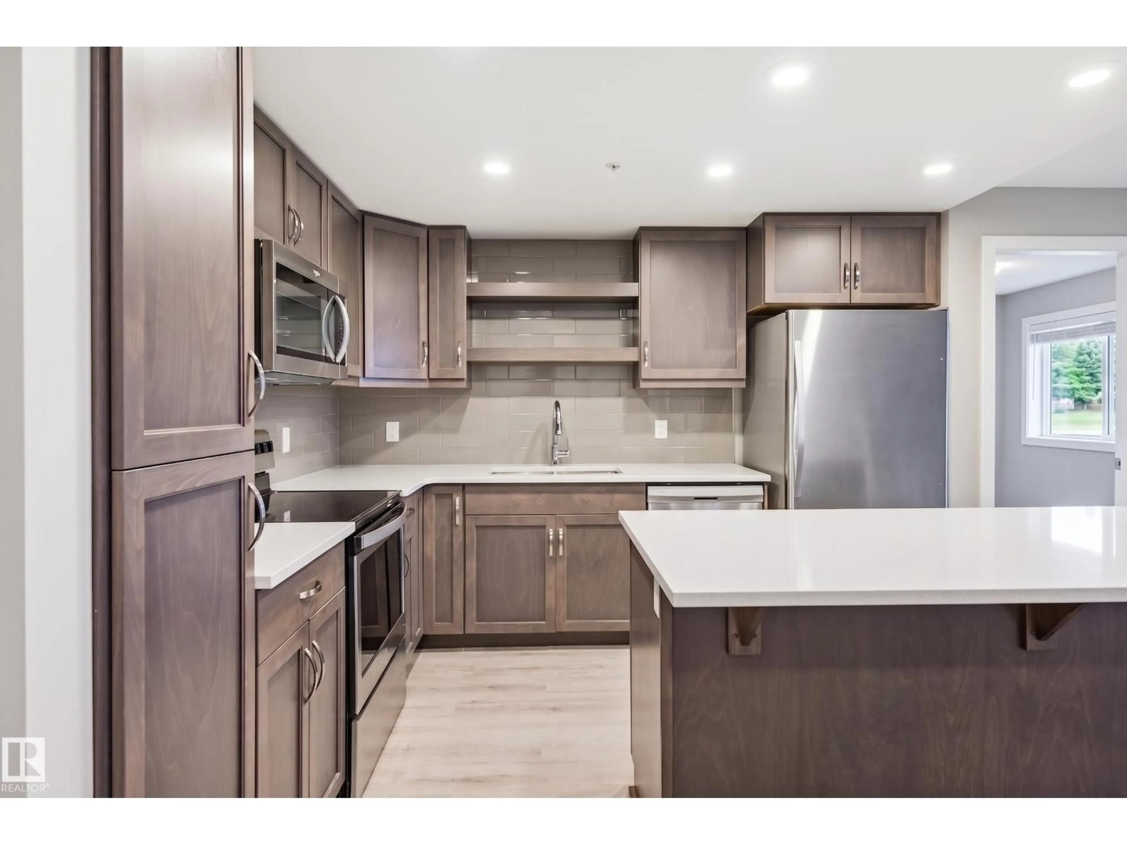 Open concept kitchen, unknown for #232 - 5504 SCHONSEE DR, Edmonton Alberta T5Z0N9