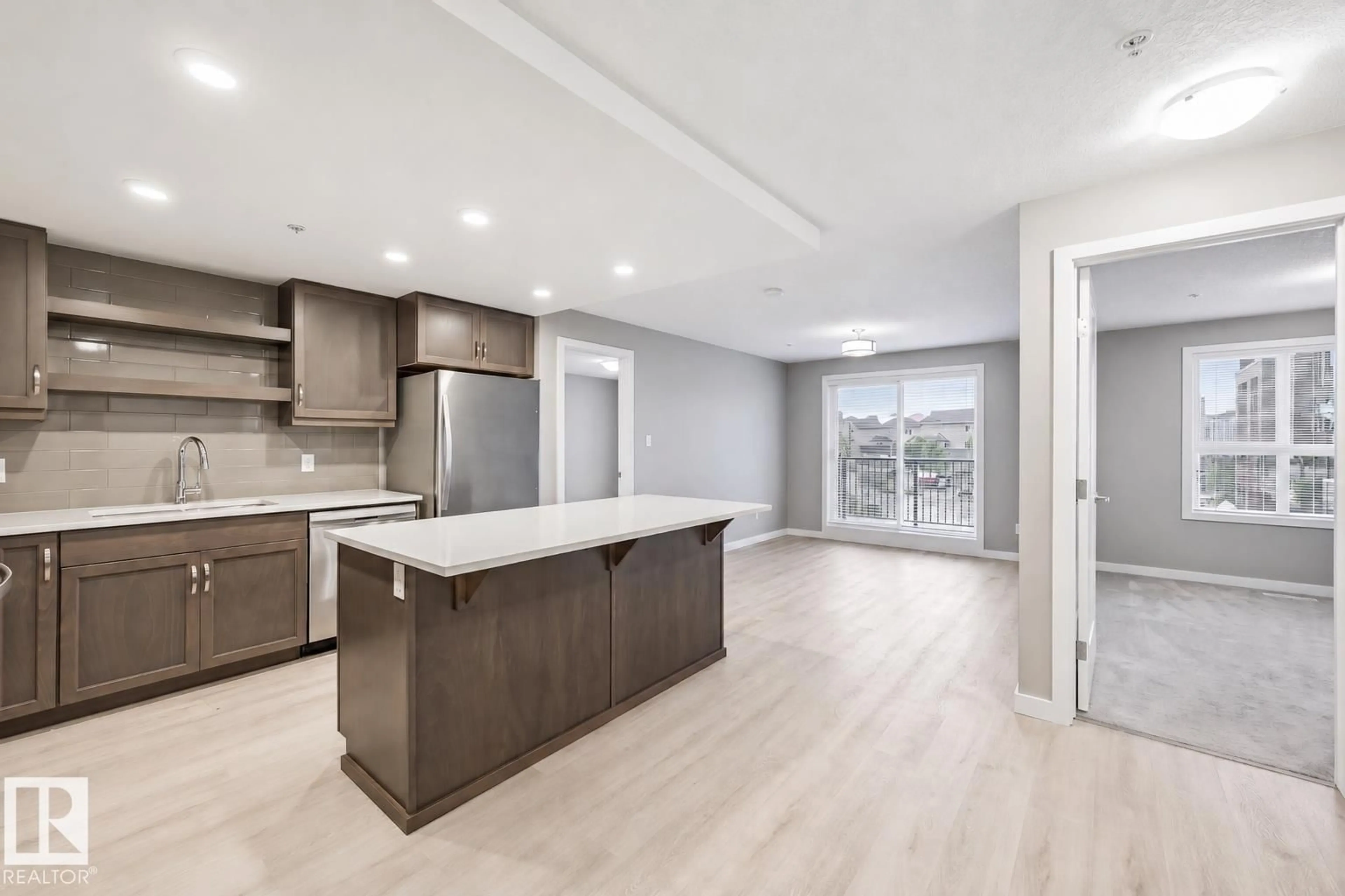 Open concept kitchen, unknown for #232 - 5504 SCHONSEE DR, Edmonton Alberta T5Z0N9
