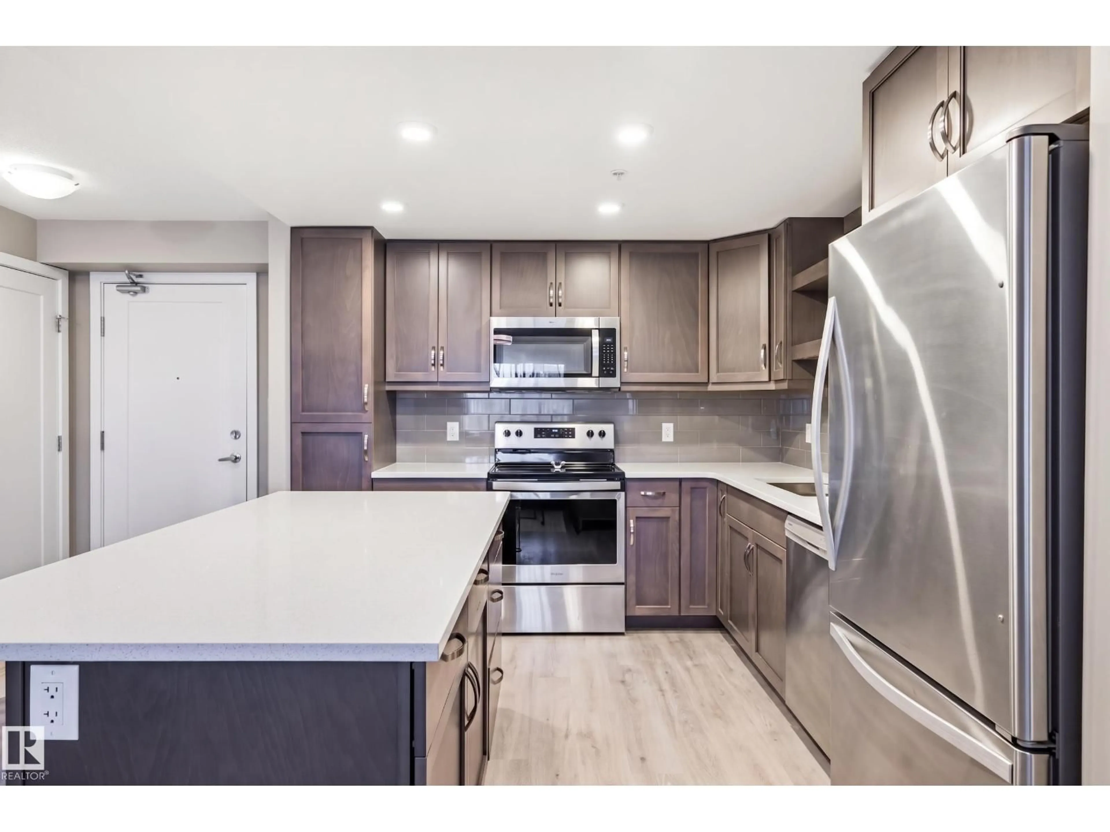 Open concept kitchen, unknown for #232 - 5504 SCHONSEE DR, Edmonton Alberta T5Z0N9