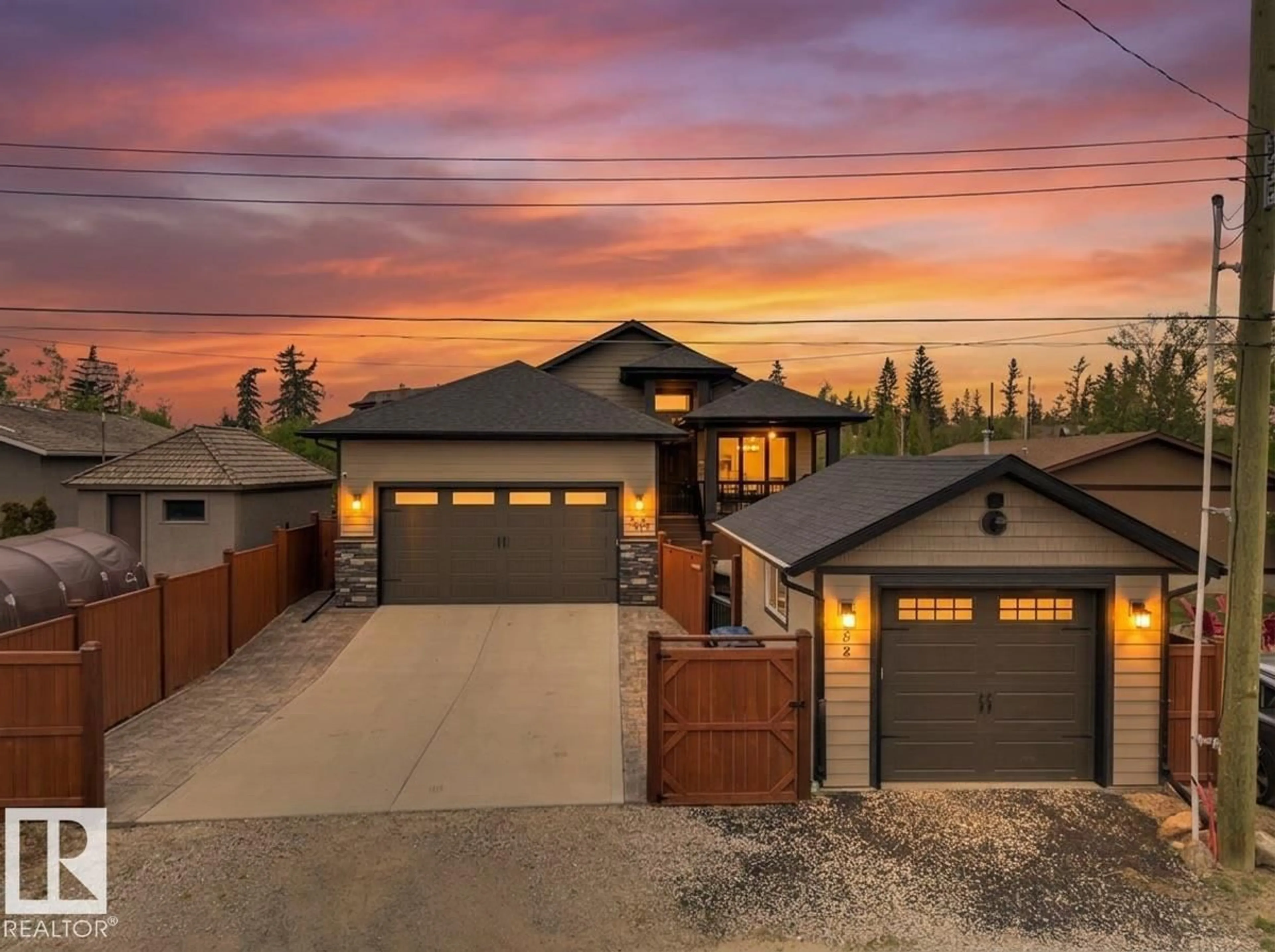 Home with brick exterior material, street for 5052 LAKESHORE DR, Sylvan Lake Alberta T4S2L7