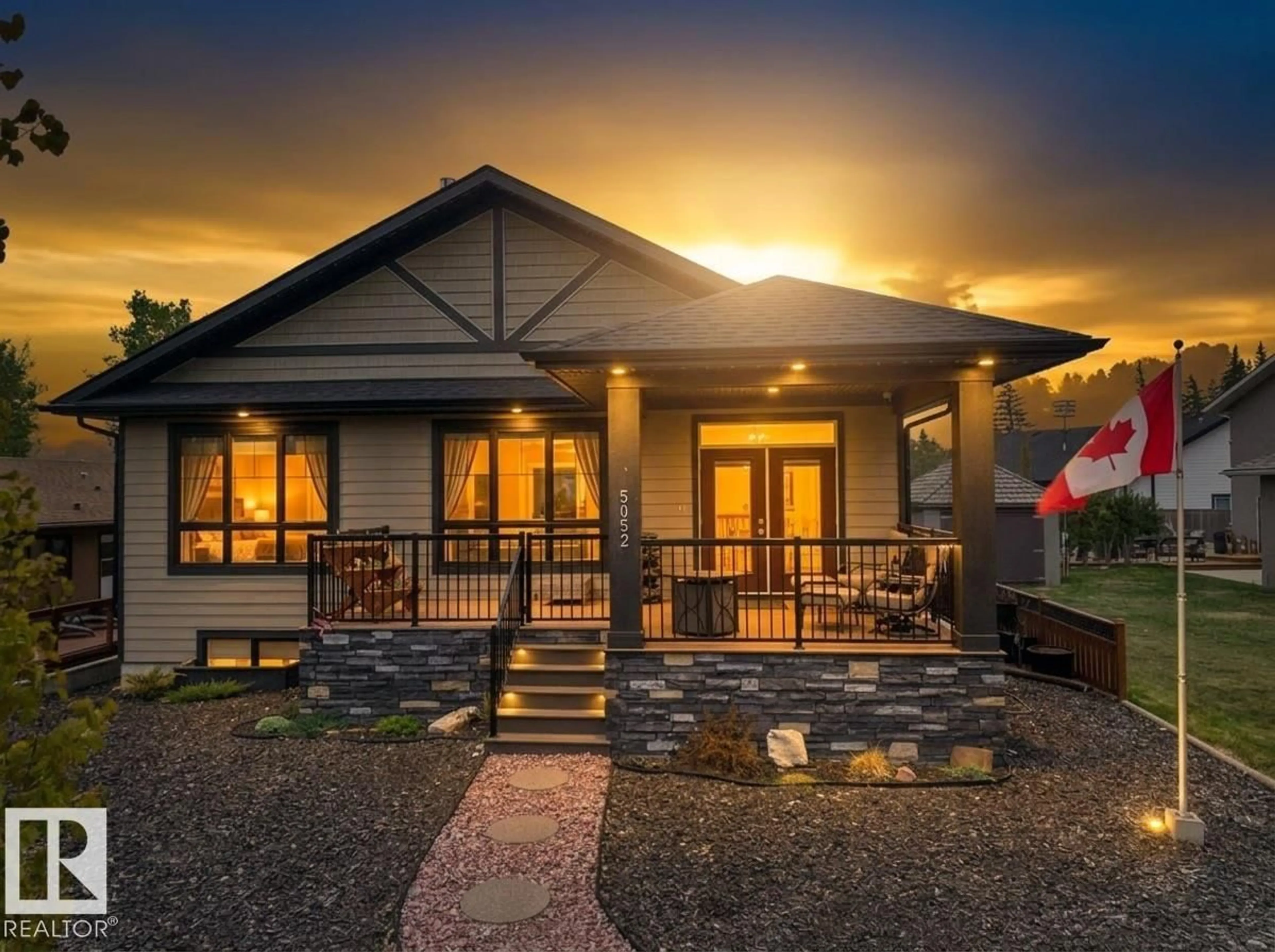 Home with vinyl exterior material, mountain view for 5052 LAKESHORE DR, Sylvan Lake Alberta T4S2L7
