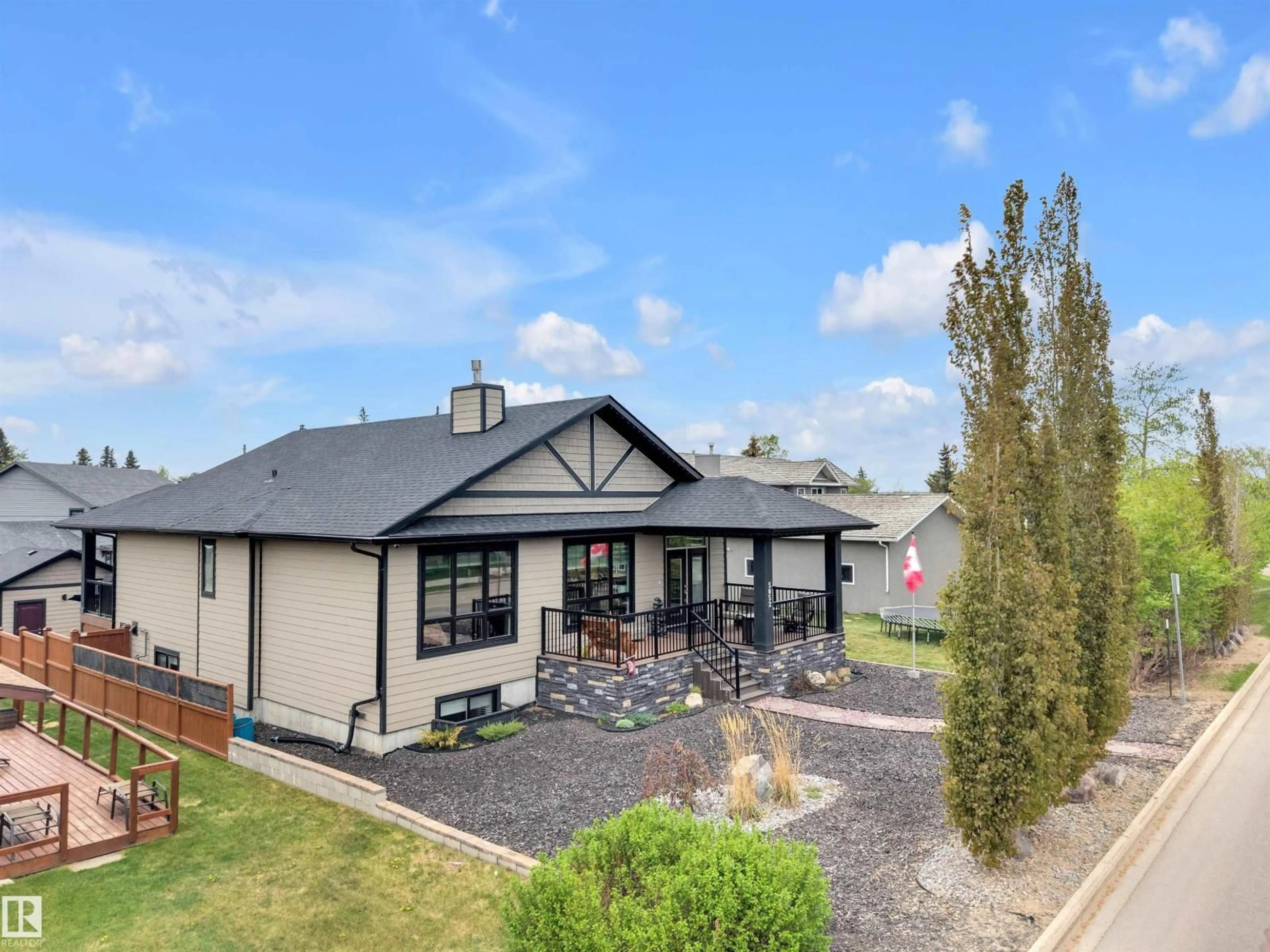 A pic from outside/outdoor area/front of a property/back of a property/a pic from drone, unknown for 5052 LAKESHORE DR, Sylvan Lake Alberta T4S2L7