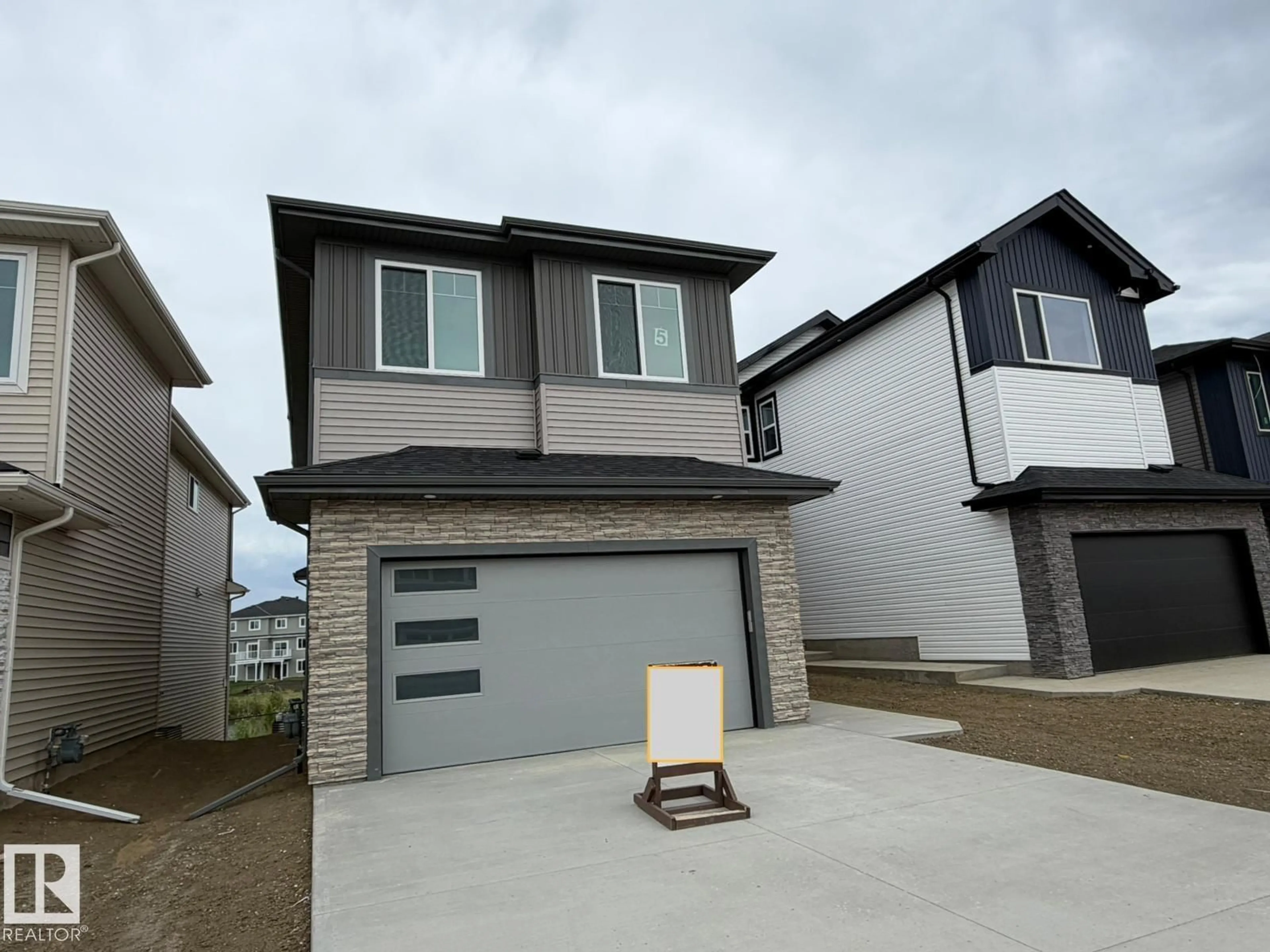 Home with vinyl exterior material, street for 5 AXELWOOD CR, Spruce Grove Alberta T7X4G4