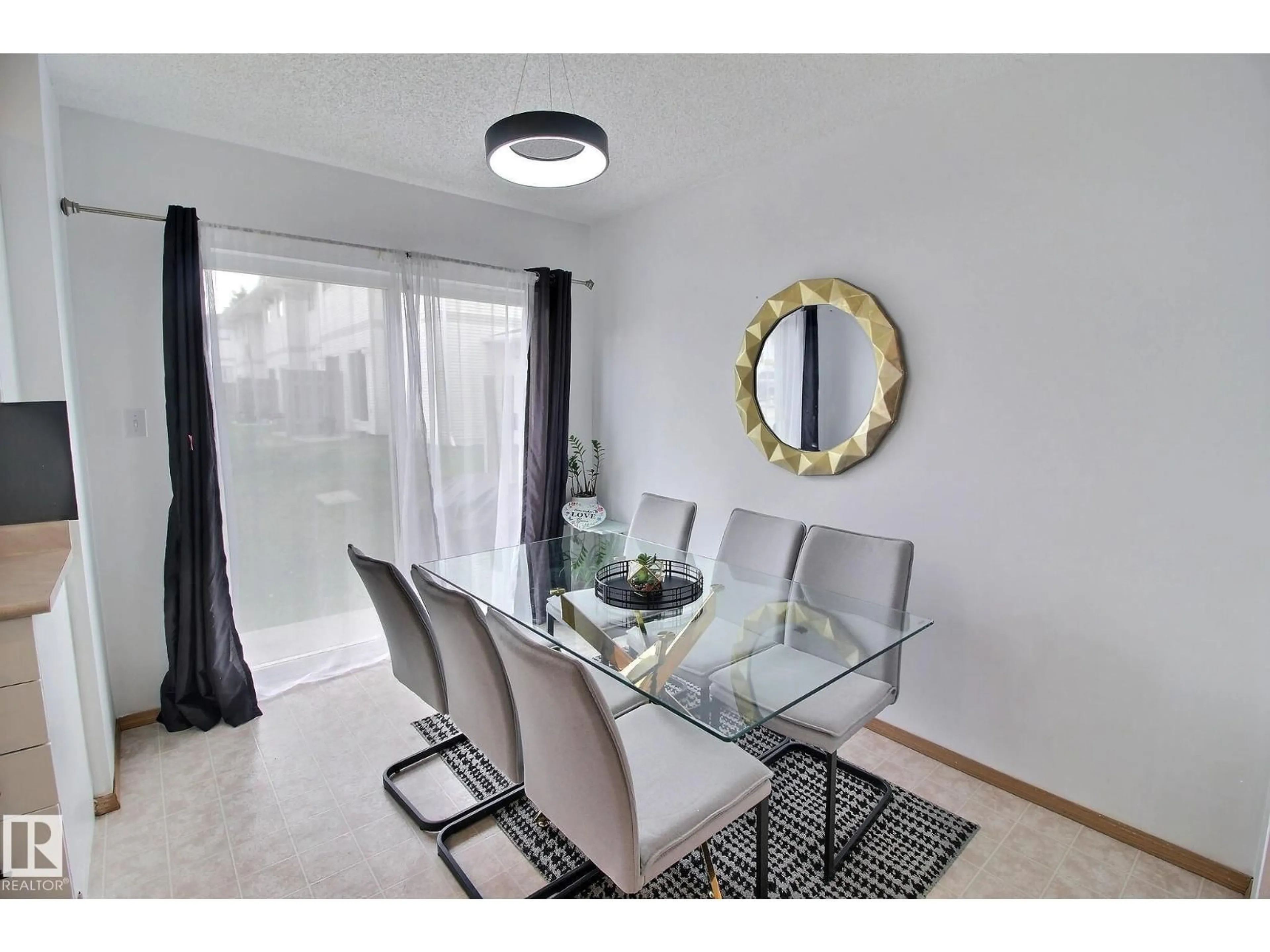 Dining room, wood/laminate floor for 701 - 610 KING ST, Spruce Grove Alberta T7Z4J9