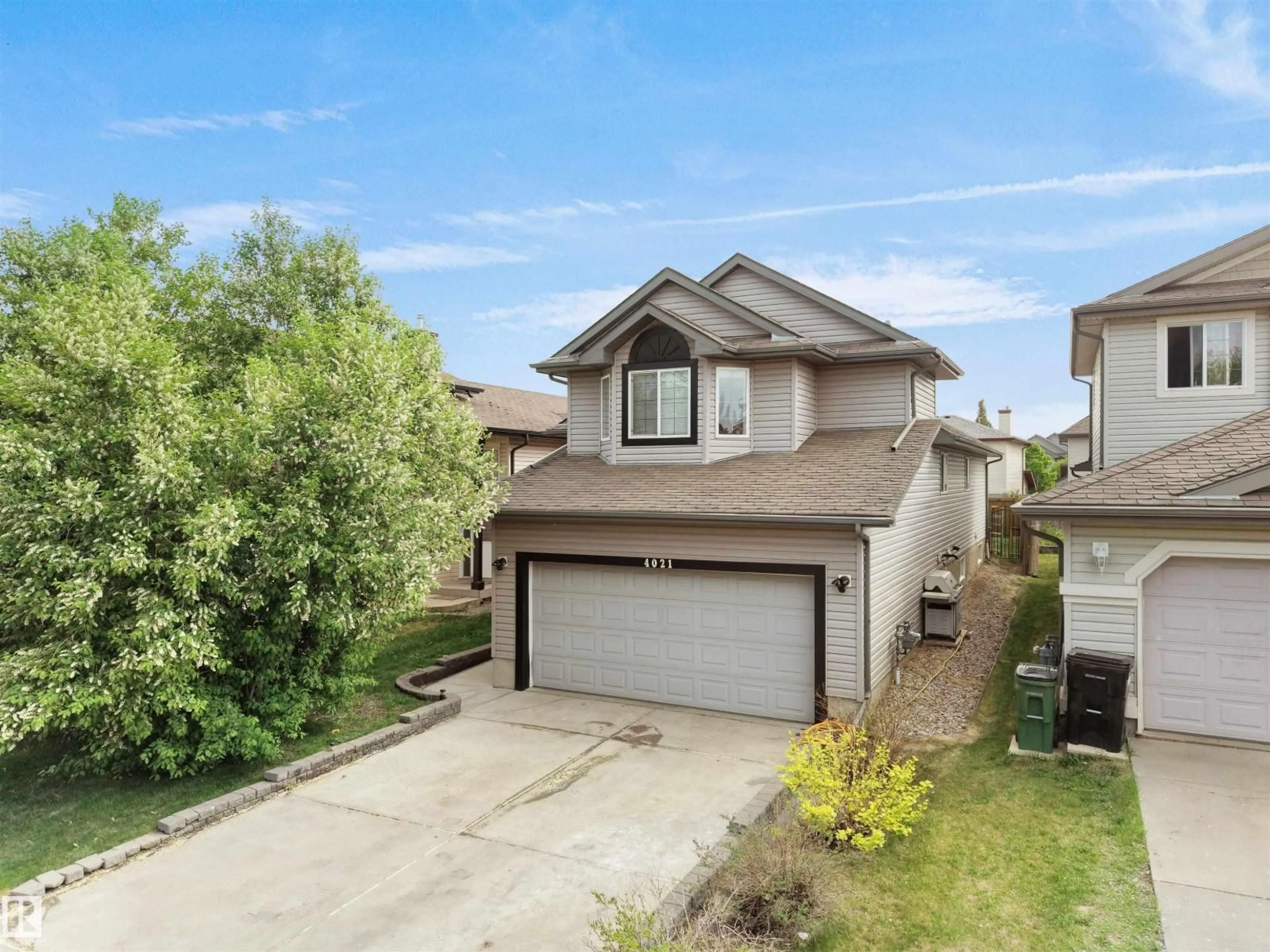 A pic from outside/outdoor area/front of a property/back of a property/a pic from drone, street for 4021 158 AV, Edmonton Alberta T5Y0A3