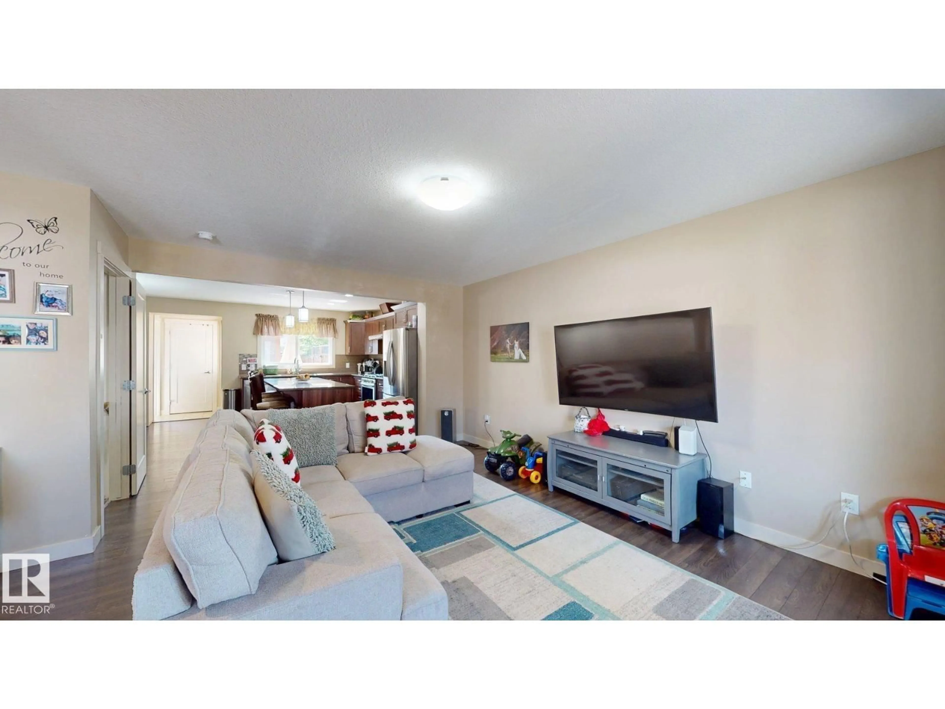Living room with furniture, unknown for 6824 EVANS WD, Edmonton Alberta T6M0T3