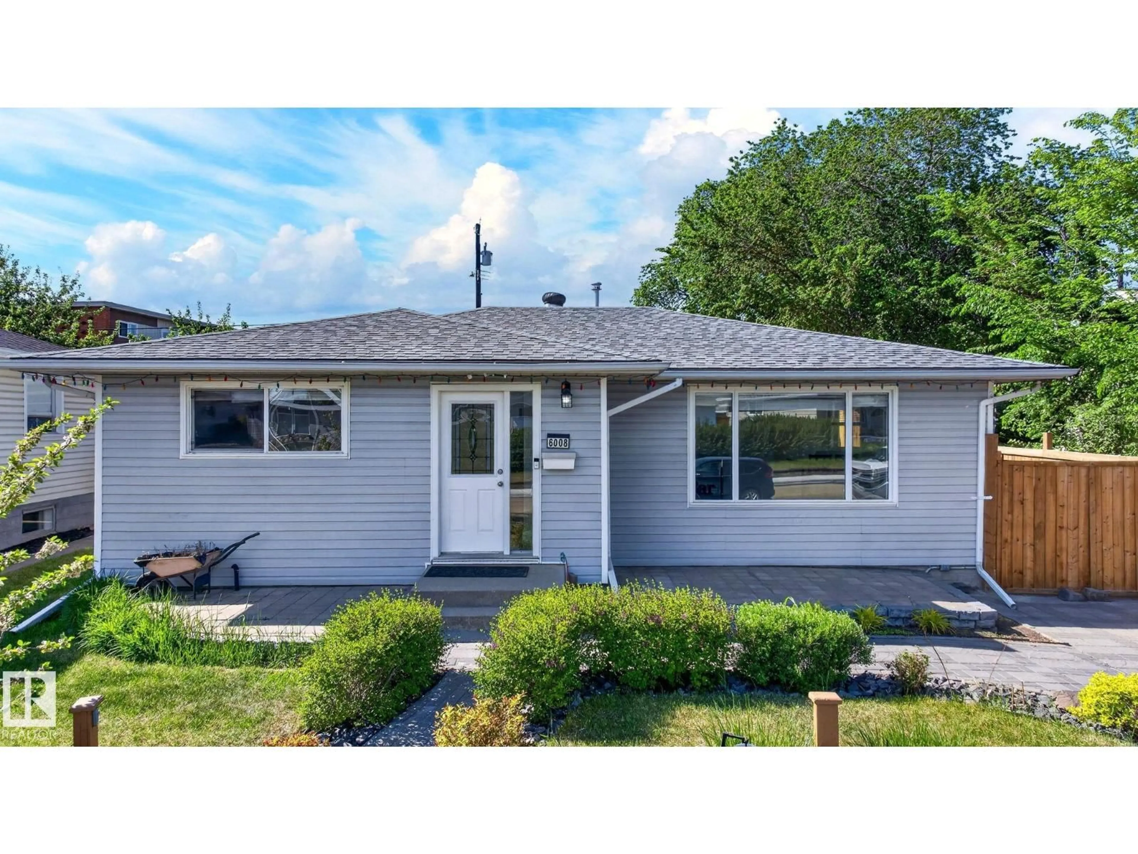 Home with vinyl exterior material, street for NW - 6008 97A AV, Edmonton Alberta T6B1E3