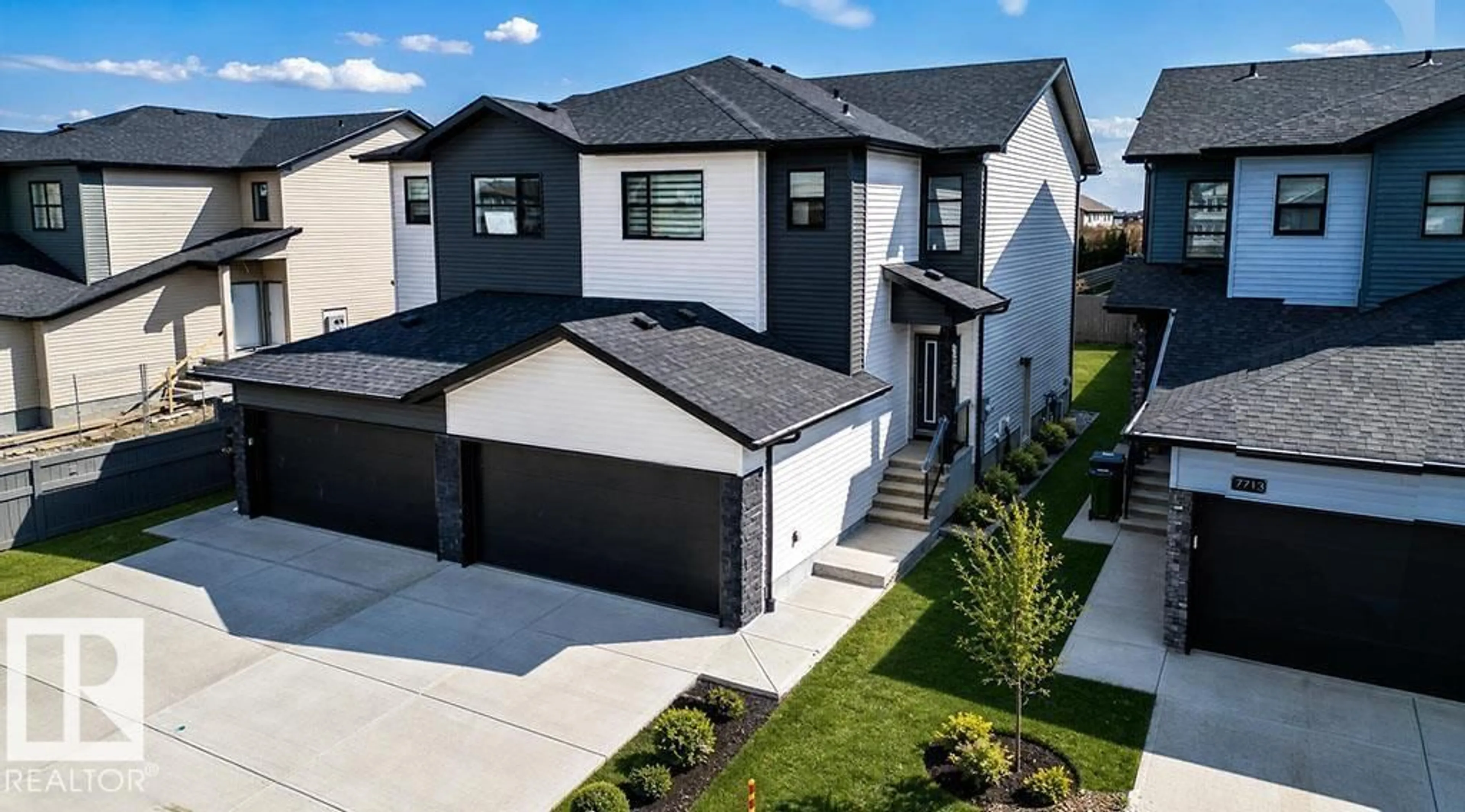 A pic from outside/outdoor area/front of a property/back of a property/a pic from drone, street for 7705 174A AV, Edmonton Alberta T5Z0W5
