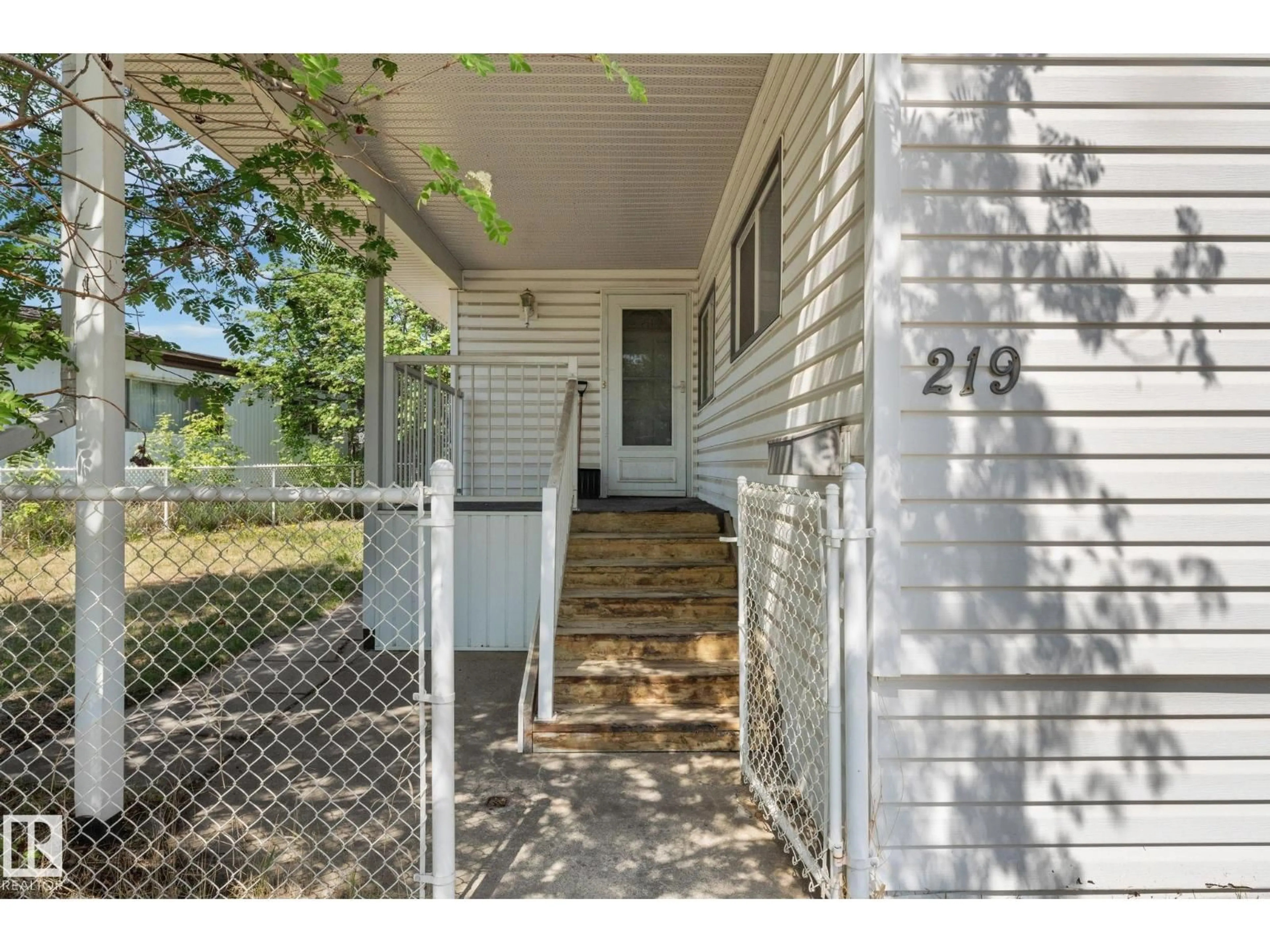 Home with vinyl exterior material, street for 219 LEE RIDGE ROAD, Edmonton Alberta T6K0N2