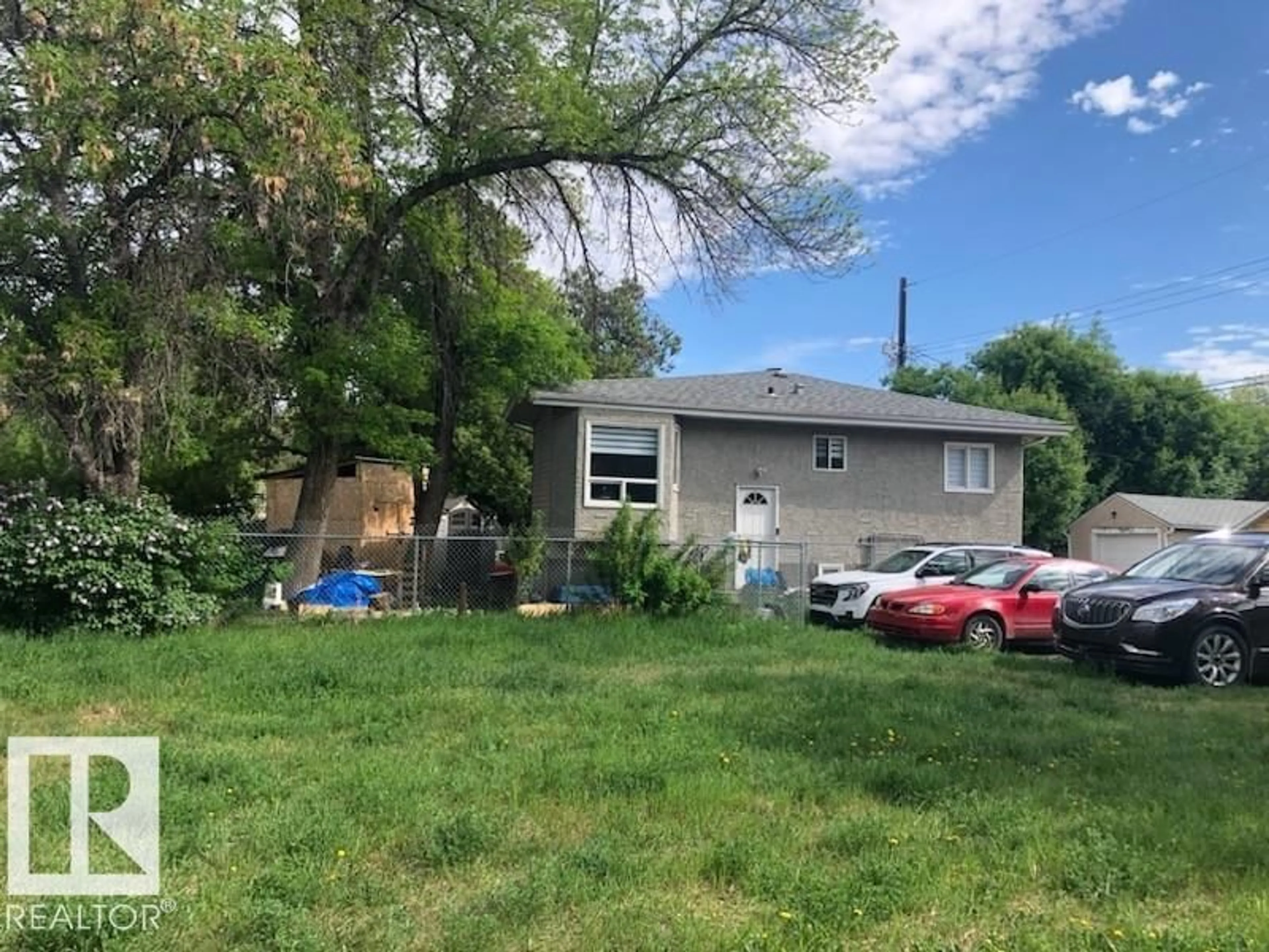 A pic from outside/outdoor area/front of a property/back of a property/a pic from drone, street for 11837 FORT RD NW, Edmonton Alberta T3J3S4