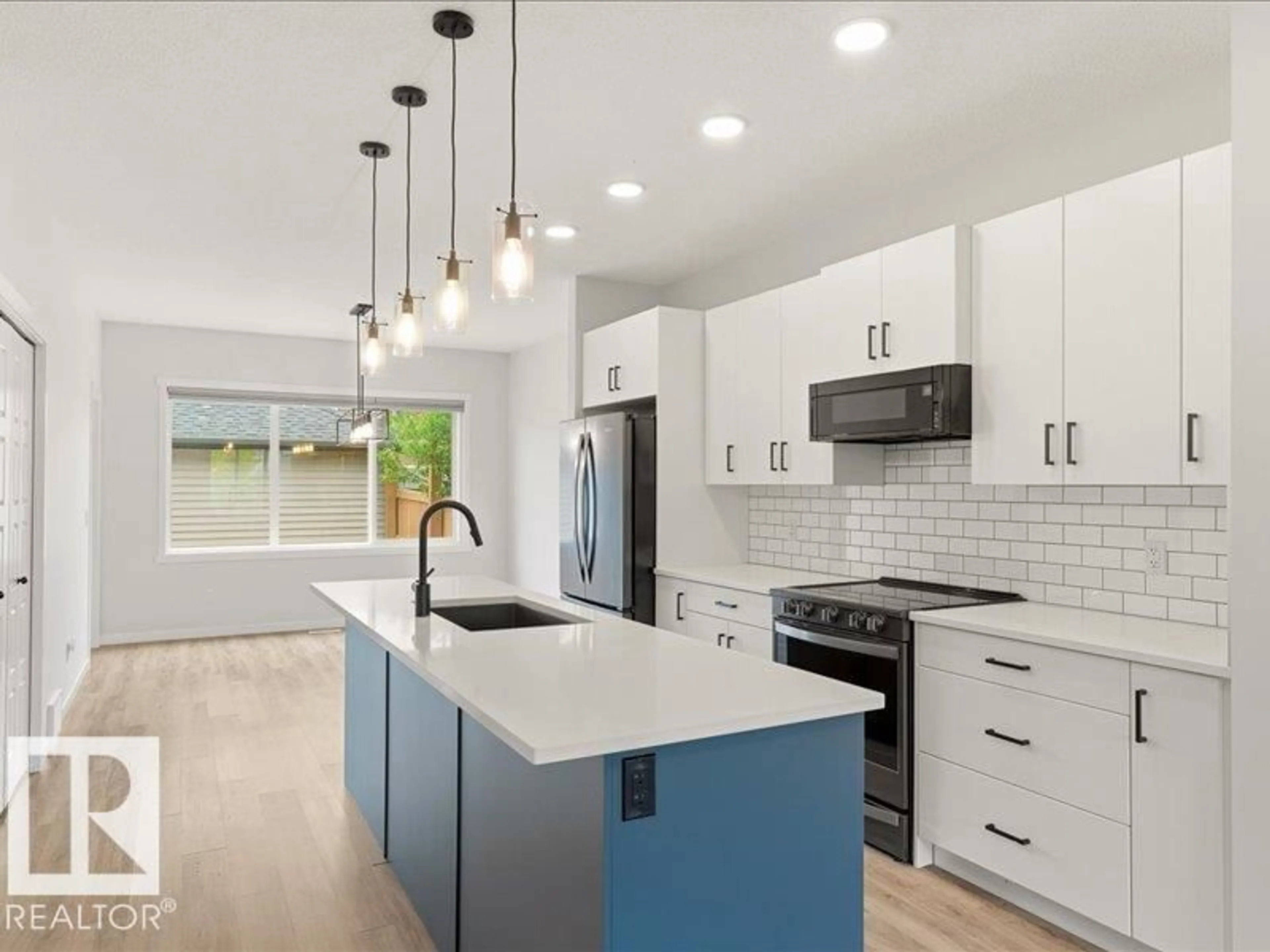Open concept kitchen, ceramic/tile floor for NW - 17487 77 ST, Edmonton Alberta T5Z0R4