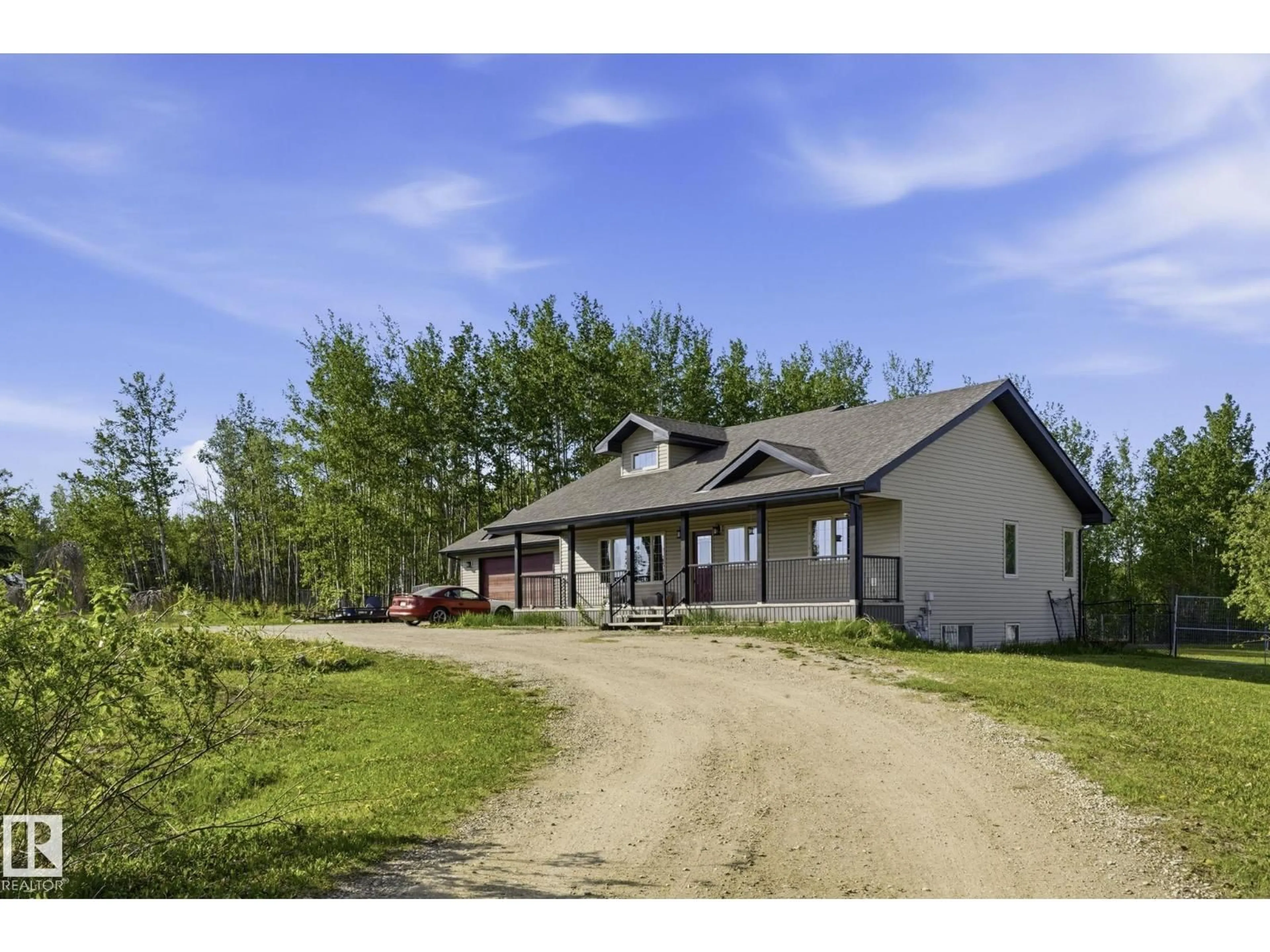 A pic from outside/outdoor area/front of a property/back of a property/a pic from drone, unknown for 10 1319 TWP RD 510, Rural Parkland County Alberta T7Y2N2