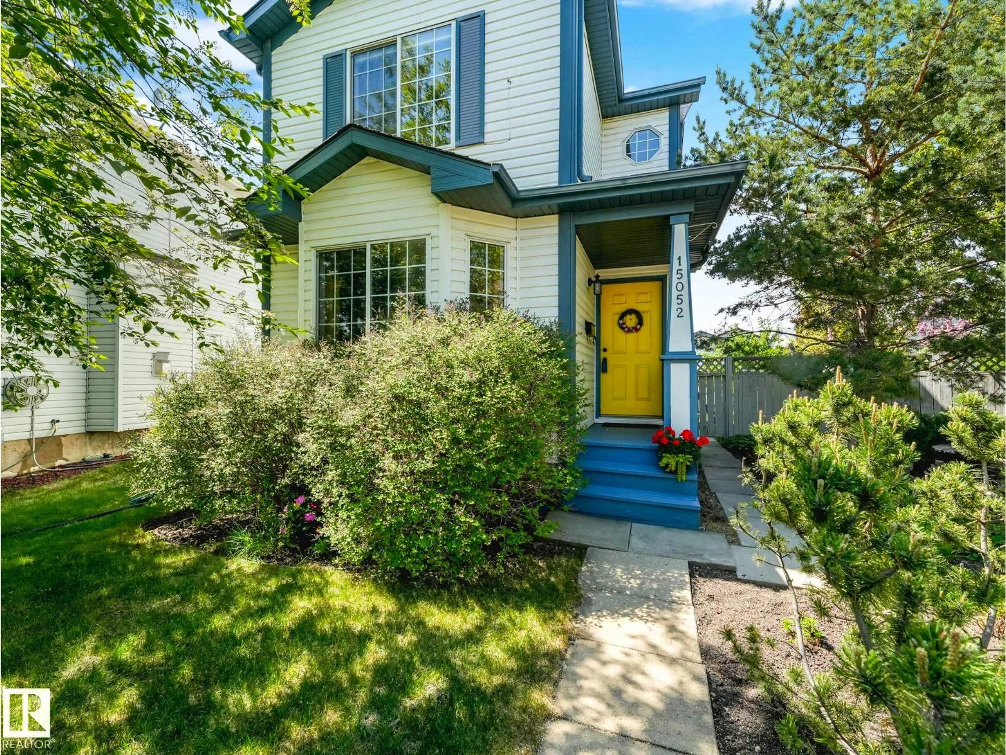 Home with vinyl exterior material, street for 15052 133 ST NW, Edmonton Alberta T6V1K9