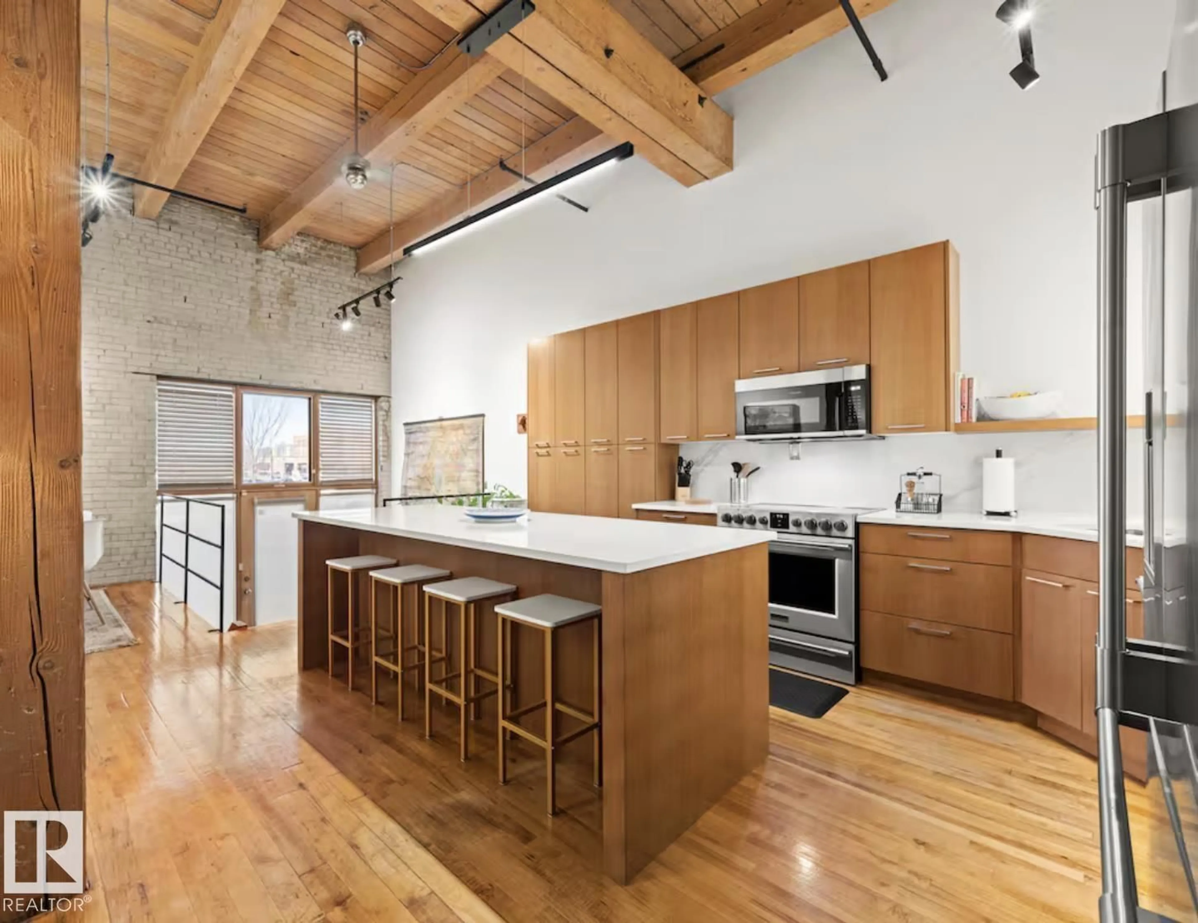 Open concept kitchen, unknown for #114 - 10309 107 ST, Edmonton Alberta T5J1K3