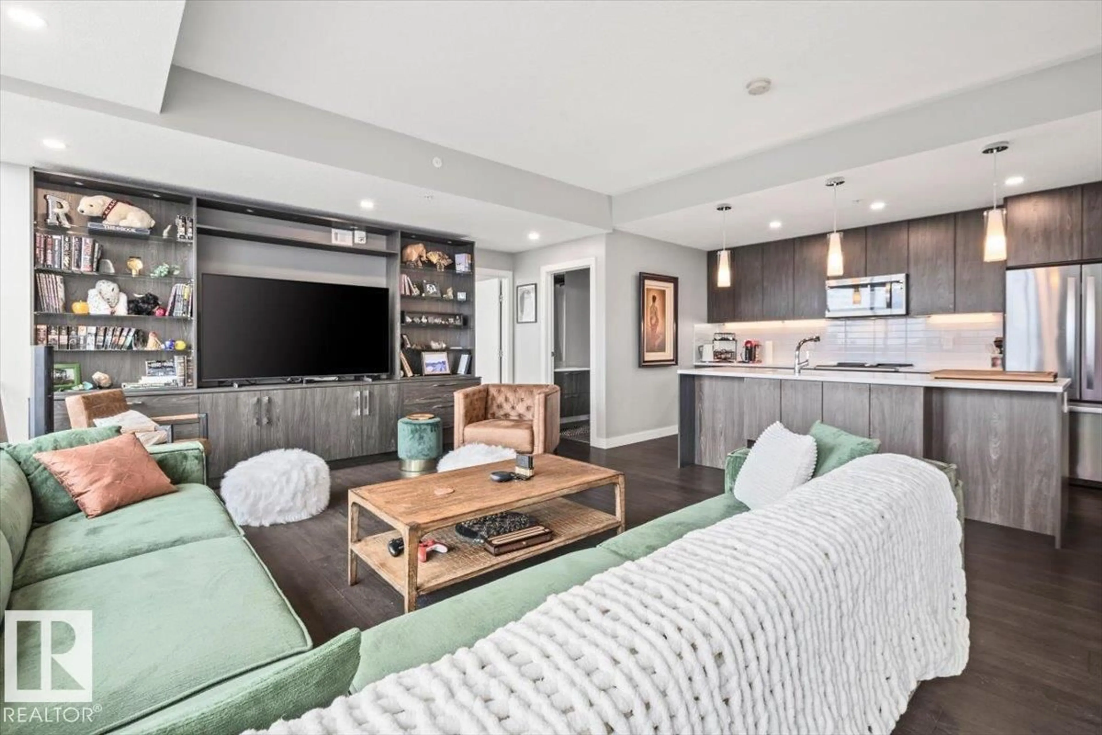 Living room with furniture, unknown for 1200 10180 103 ST NW, Edmonton Alberta T5J0L1