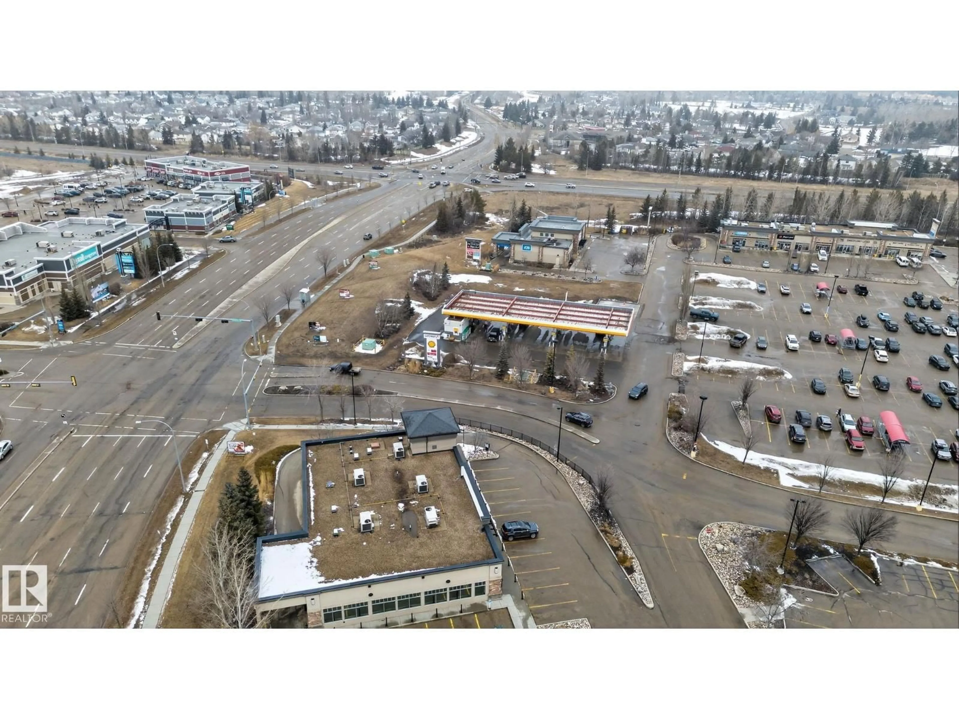 A pic from outside/outdoor area/front of a property/back of a property/a pic from drone, street for 423 2430 GUARDIAN RD NW, Edmonton Alberta T5T6X9