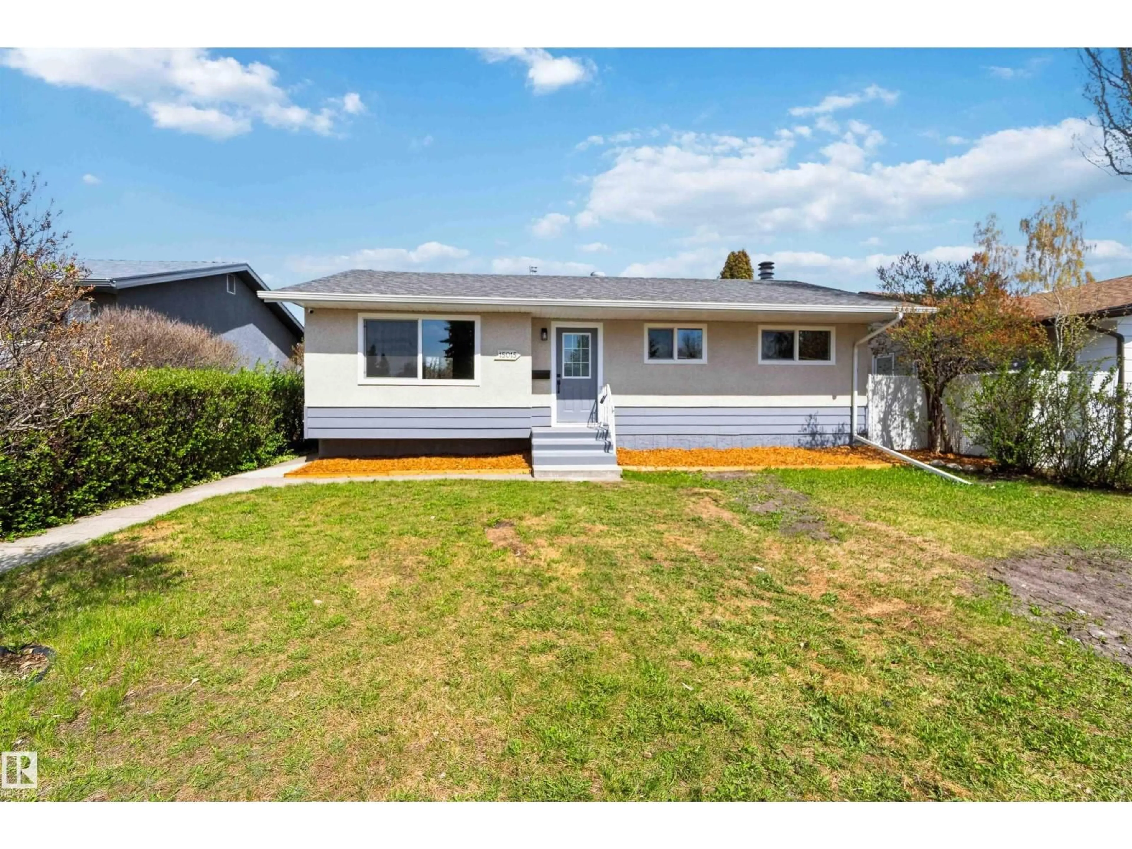 Home with vinyl exterior material, street for NW - 15015 95 ST, Edmonton Alberta T5E3Z3