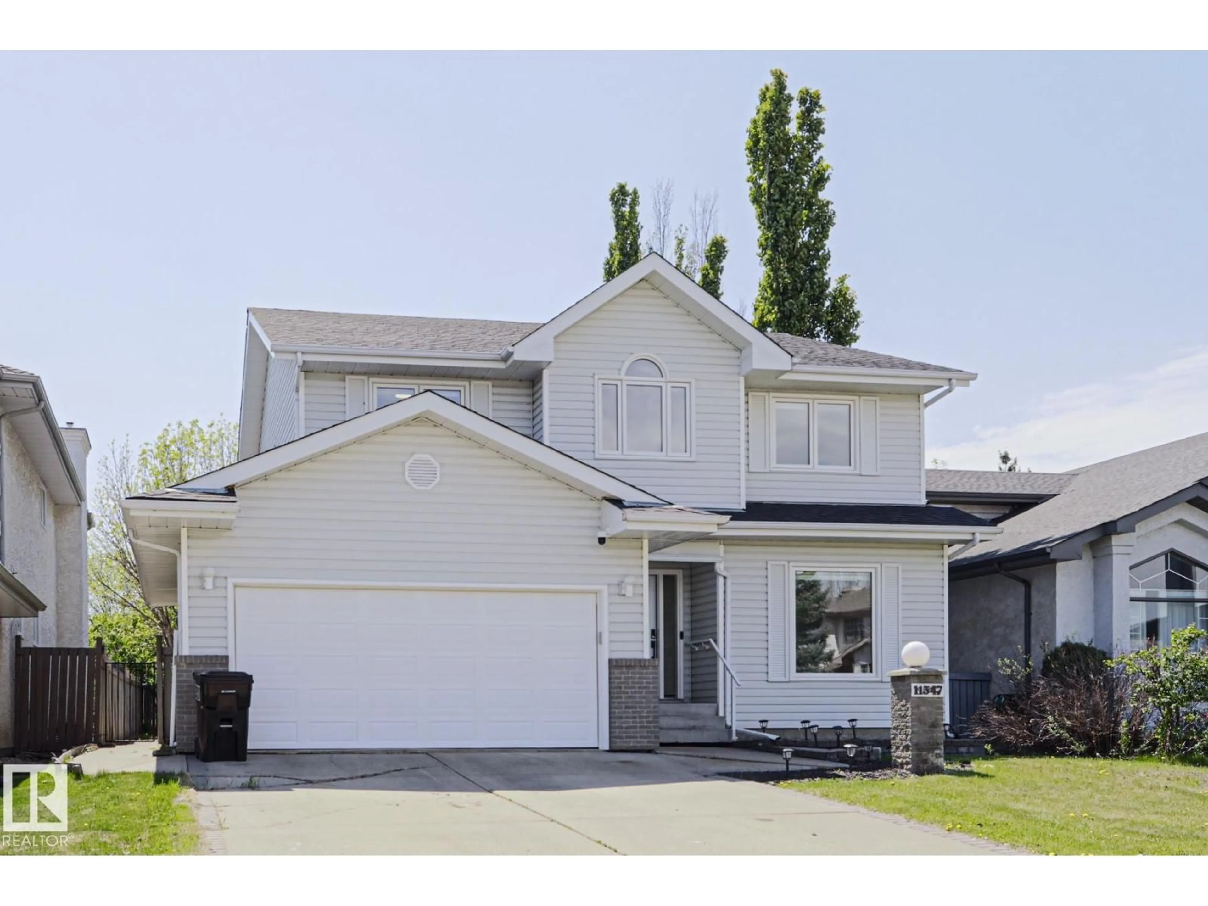 Home with vinyl exterior material, street for 11347 10 AV, Edmonton Alberta T6J6S9