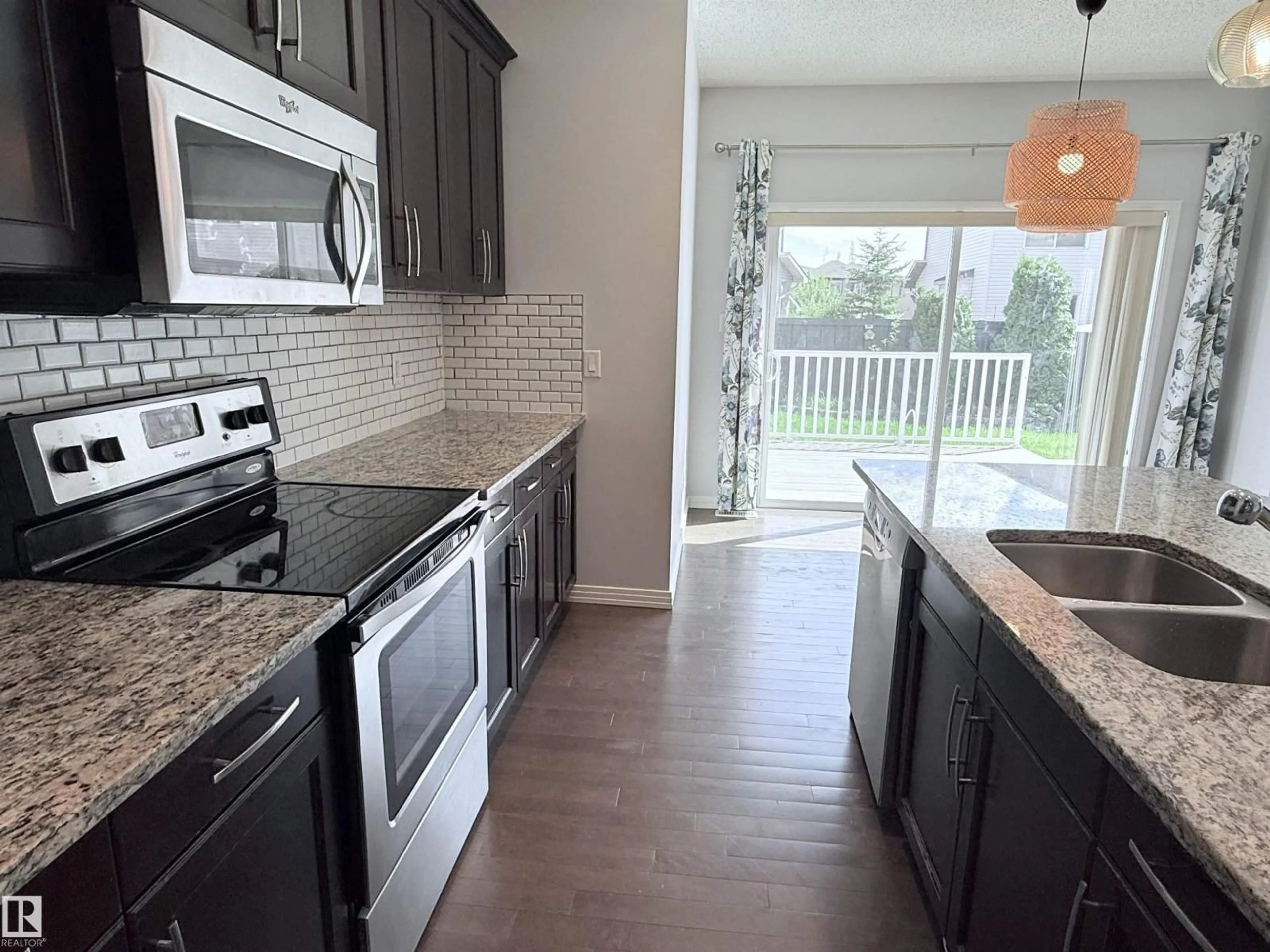 Open concept kitchen, unknown for NW - 7819 173 AV, Edmonton Alberta T5Z0H6