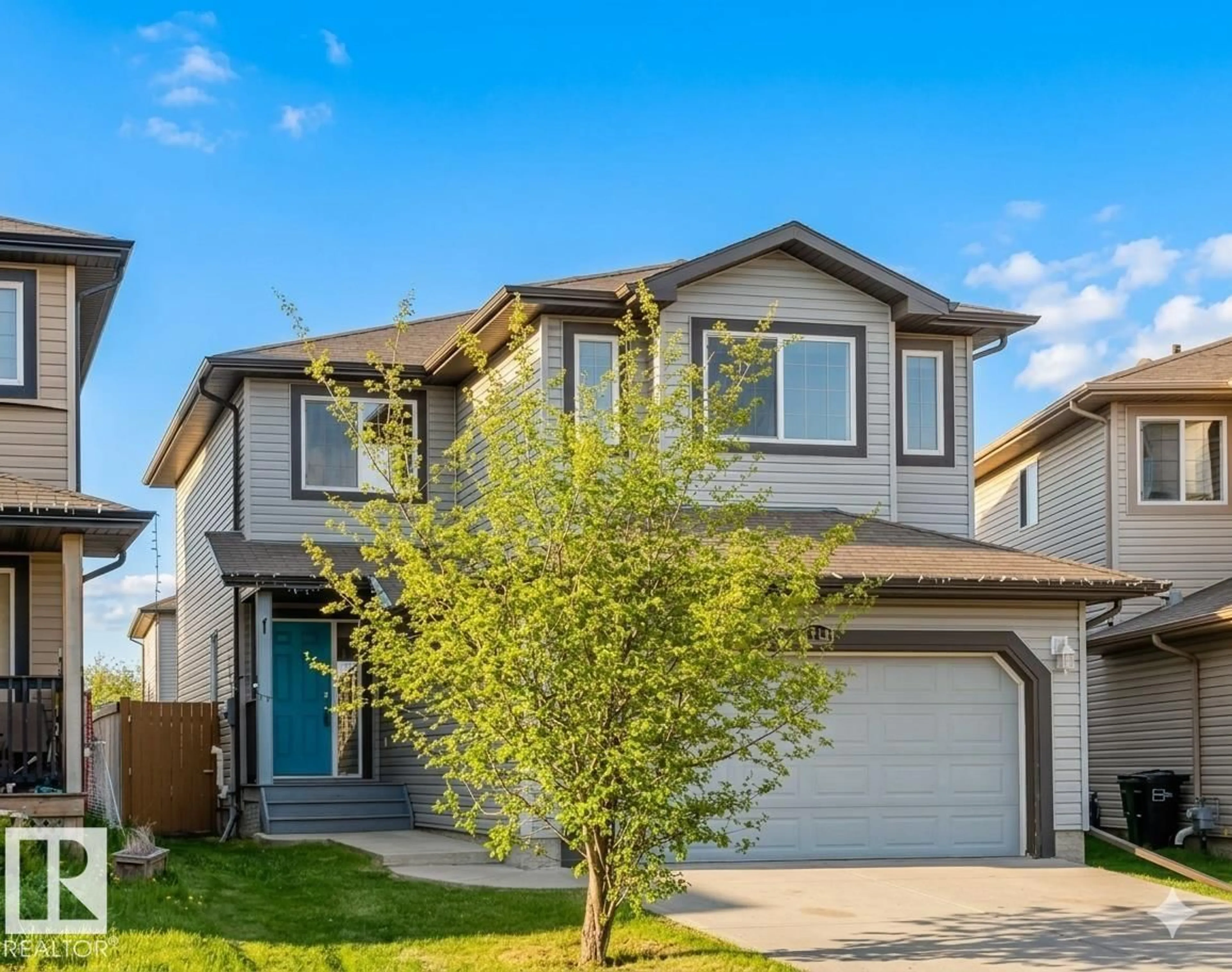 Home with vinyl exterior material, street for 1919 HAMMOND PL, Edmonton Alberta T6M0K3