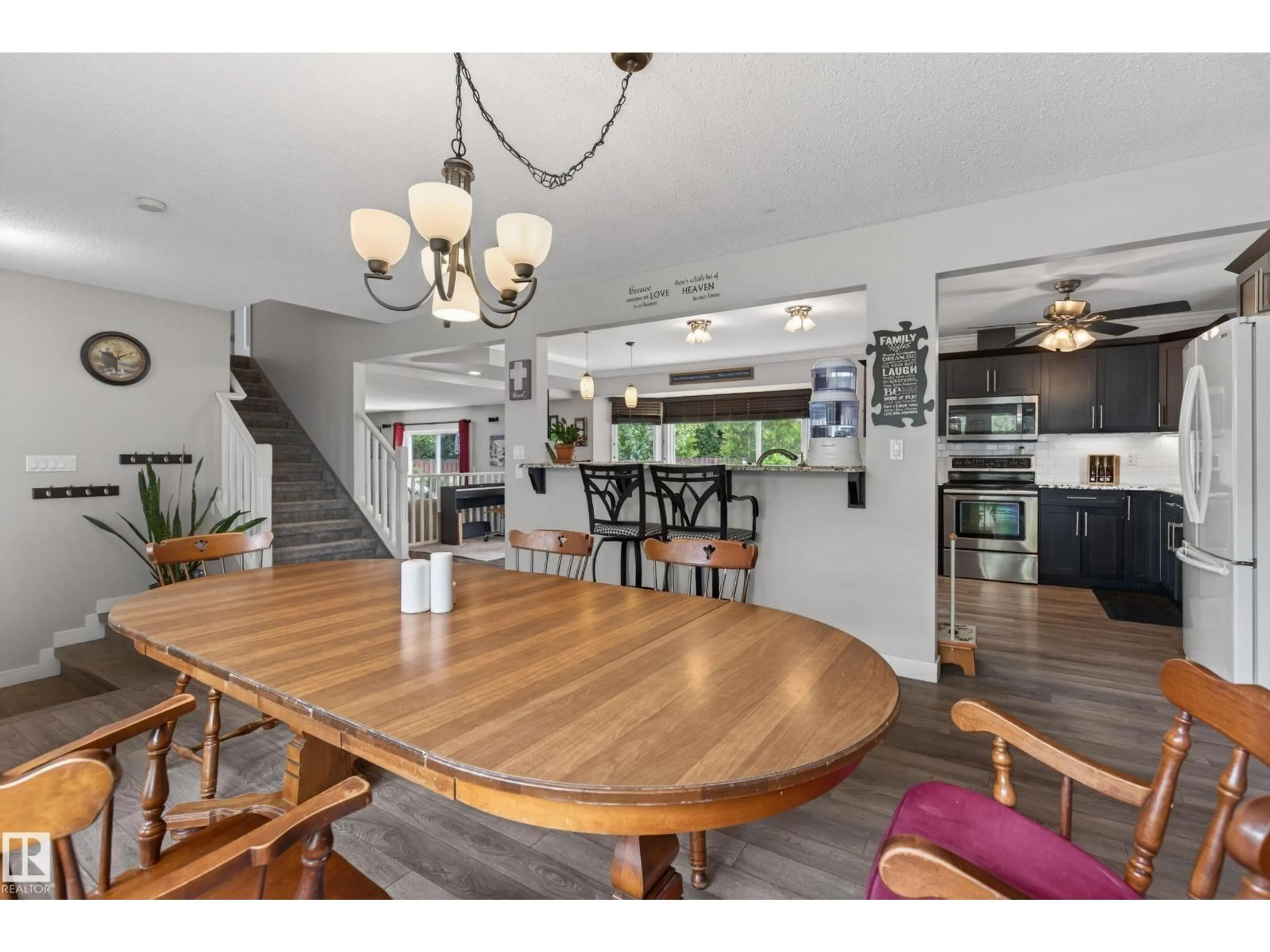 Open concept kitchen, wood/laminate floor for 10 ABBEY CR, St. Albert Alberta T8N2X2
