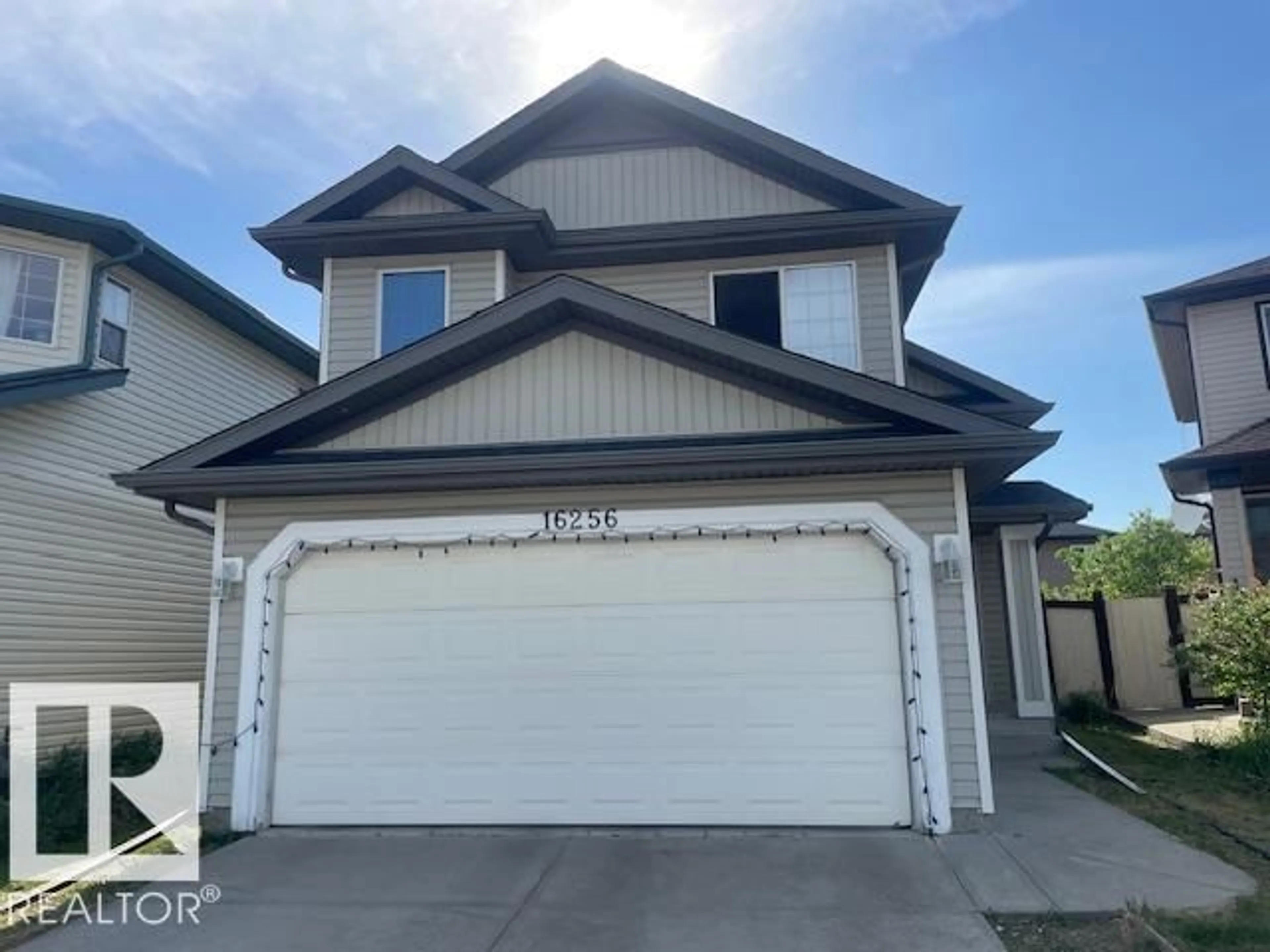 Home with vinyl exterior material, street for NW - 16256 132 ST, Edmonton Alberta T6V1X5